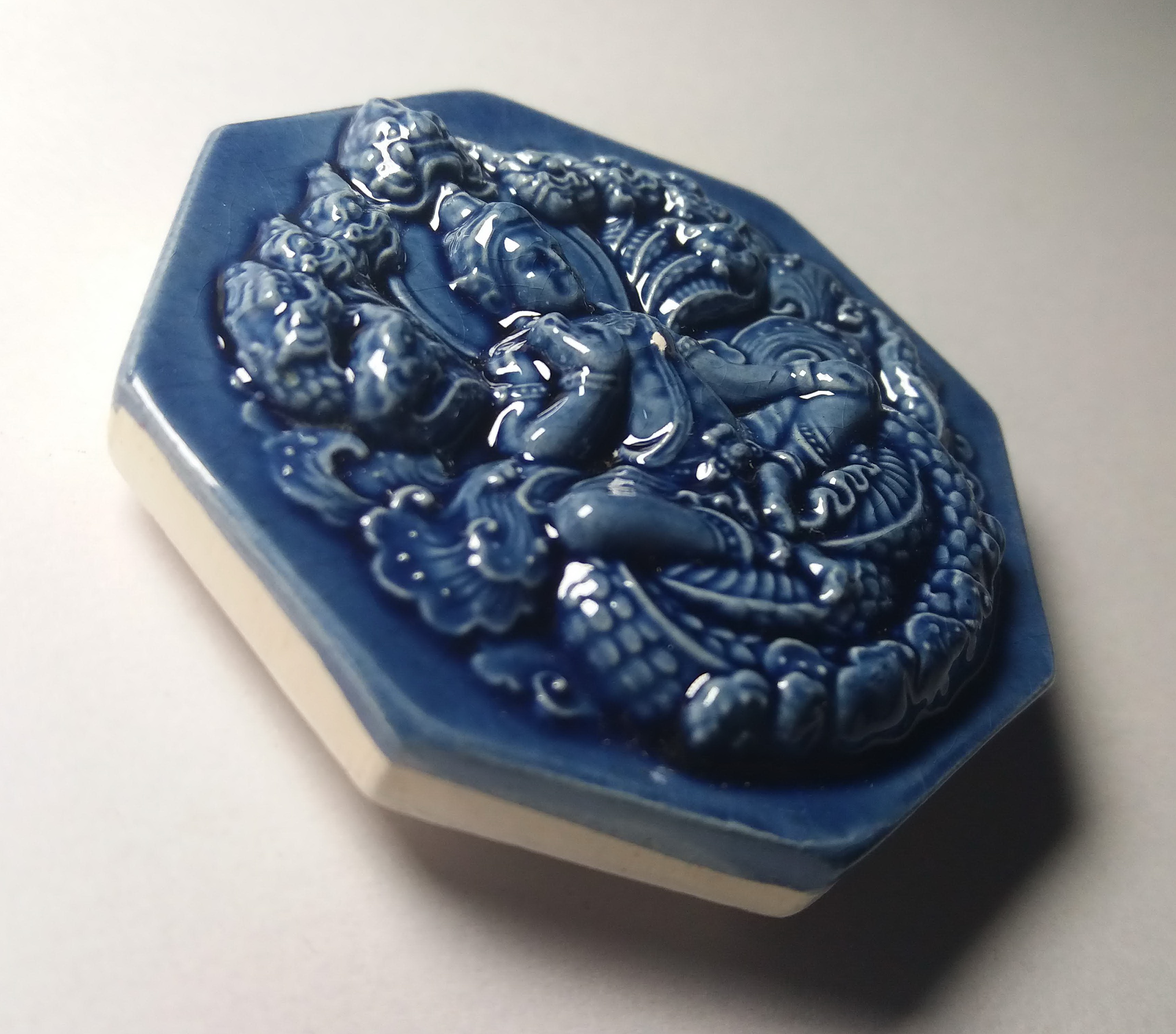 รหัสสินค้า จตุคามรามเทพ 052 จตุคามรามเทพ รุ่นอัครมหาเศรษฐี เนื้อกระเบื้องเคลือบ สีฟ้าเจ้าทะเล