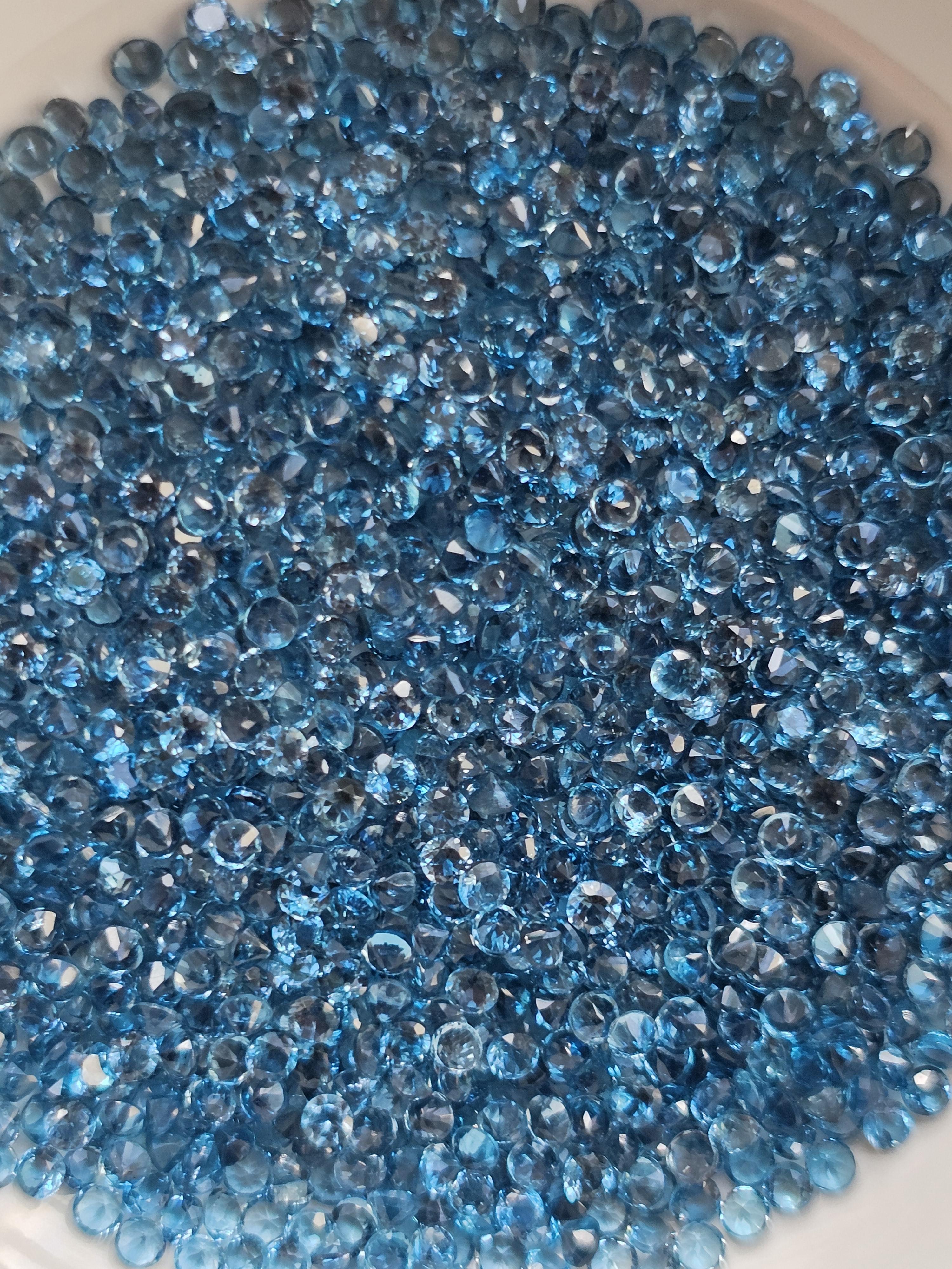 ลอนดอนบลูโทปาสกลมเจียรเหลี่ยม 2.0มม.1 กะรัต