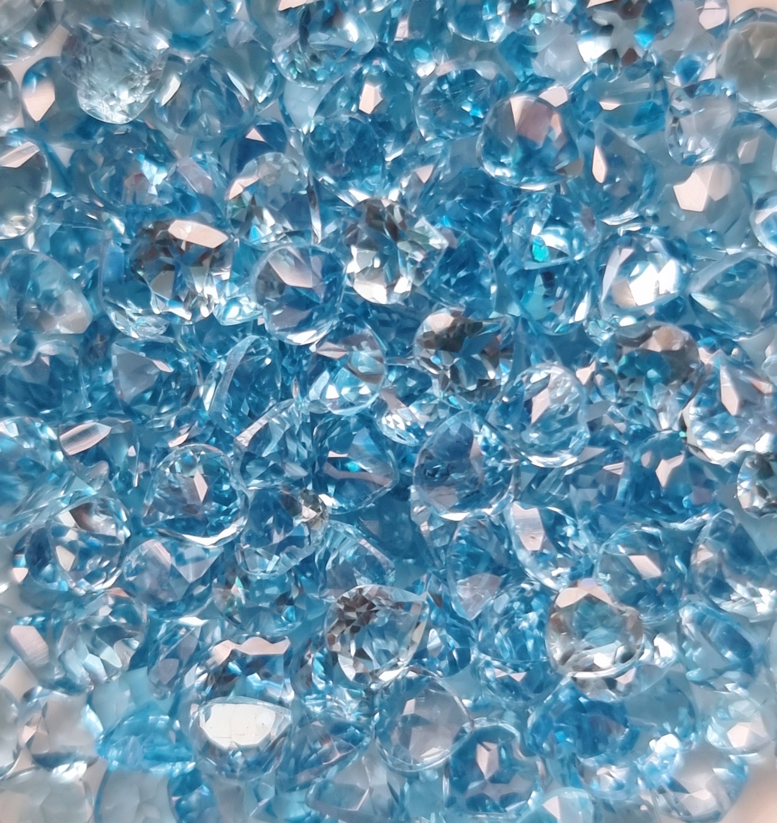 พลอยบลูโทปาสหัวใจ 4 มม. 5 กะรัต