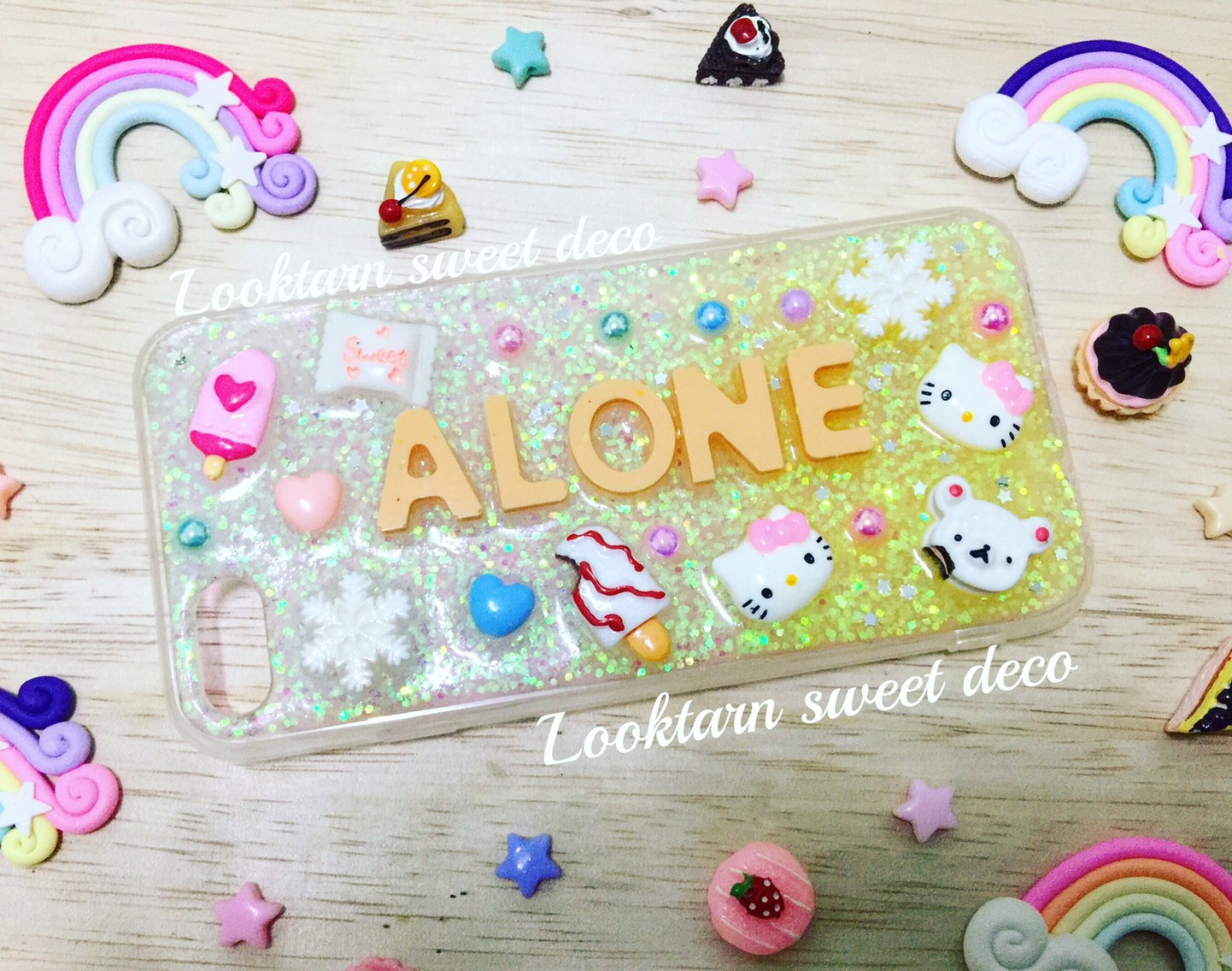 เคสกากเพชรขาว เหลือง อักษรสีส้ม