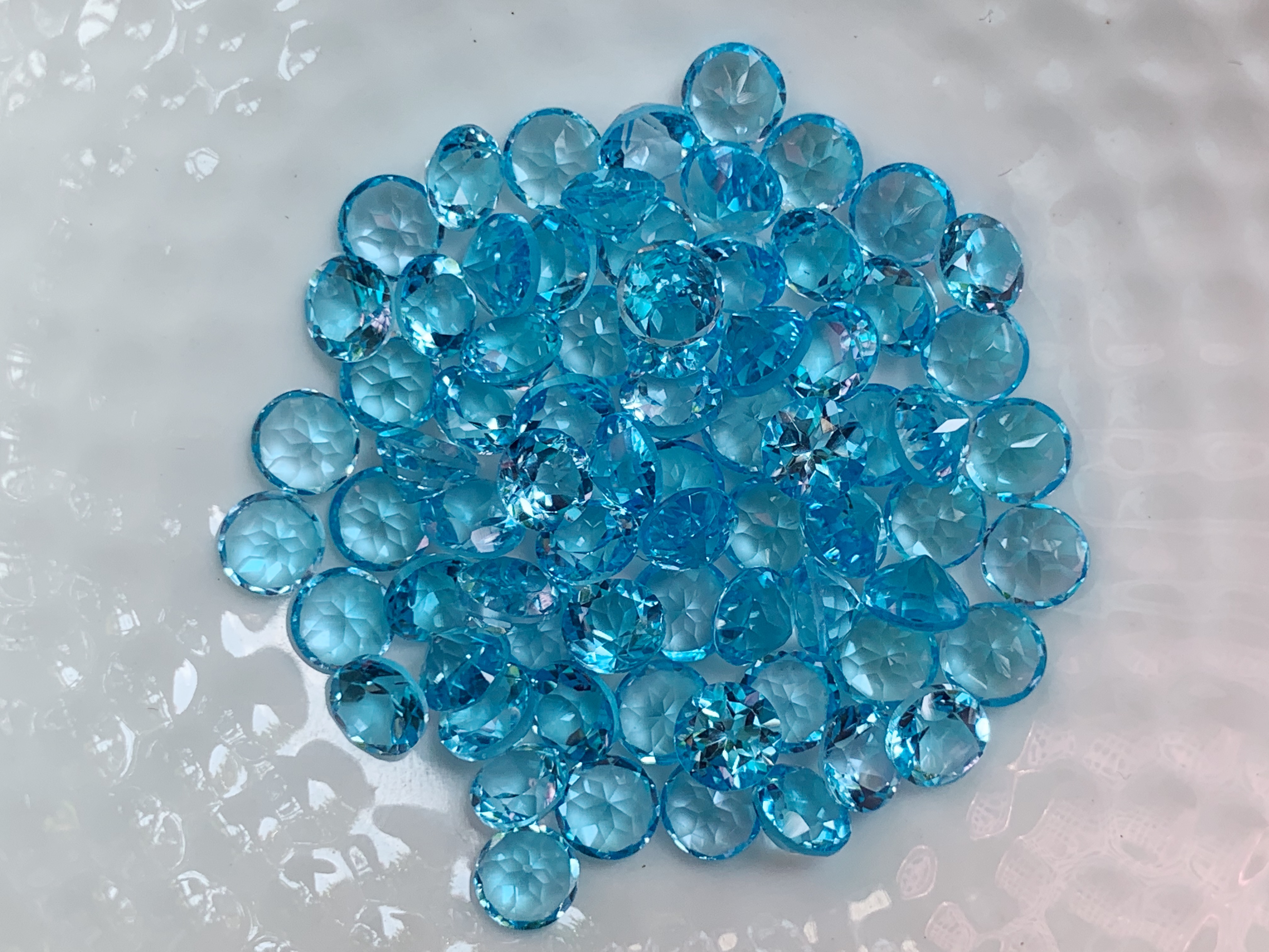 บลูโทปาสกลม 5.0 มม. 5 กะรัต