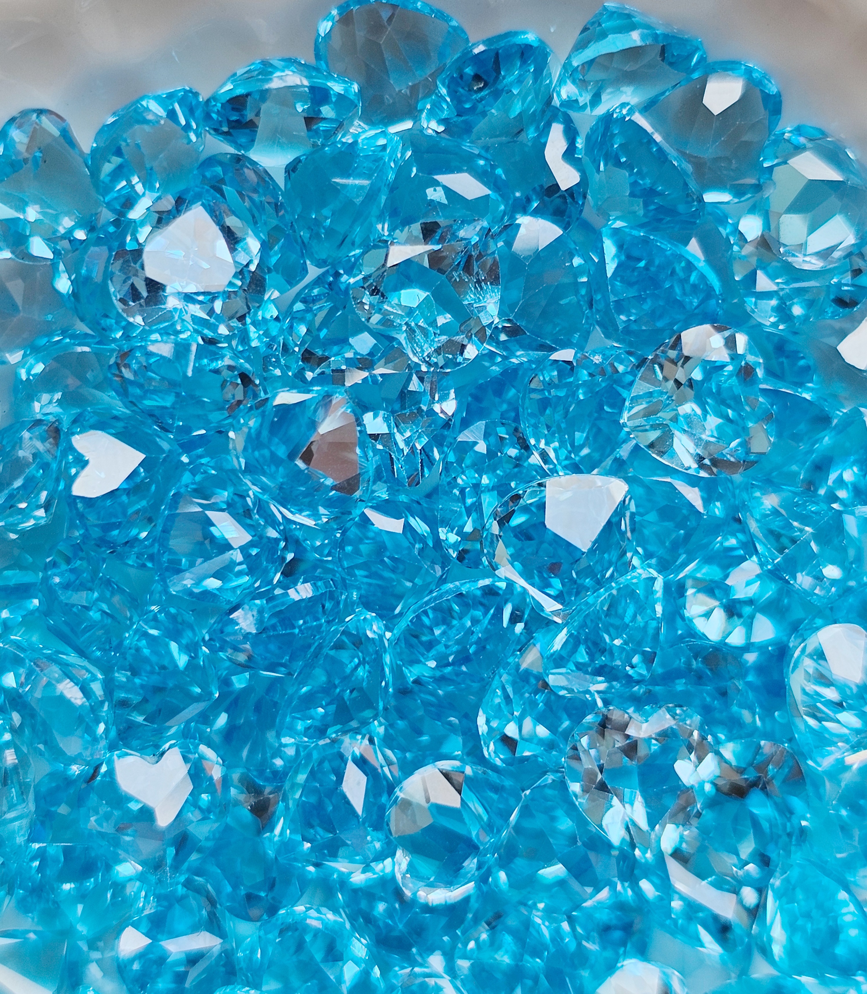 พลอยบลูโทปาสหัวใจ 5.5-5.7มม. 5 กะรัต