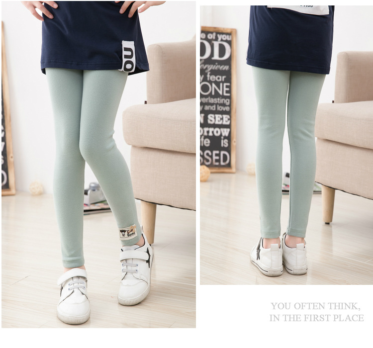 P30983พร้อมส่ง เลกกิ้งเด็กสีเขียวติดอาร์มตุ๊กตาน้อย+ติดโบว์สีทอง