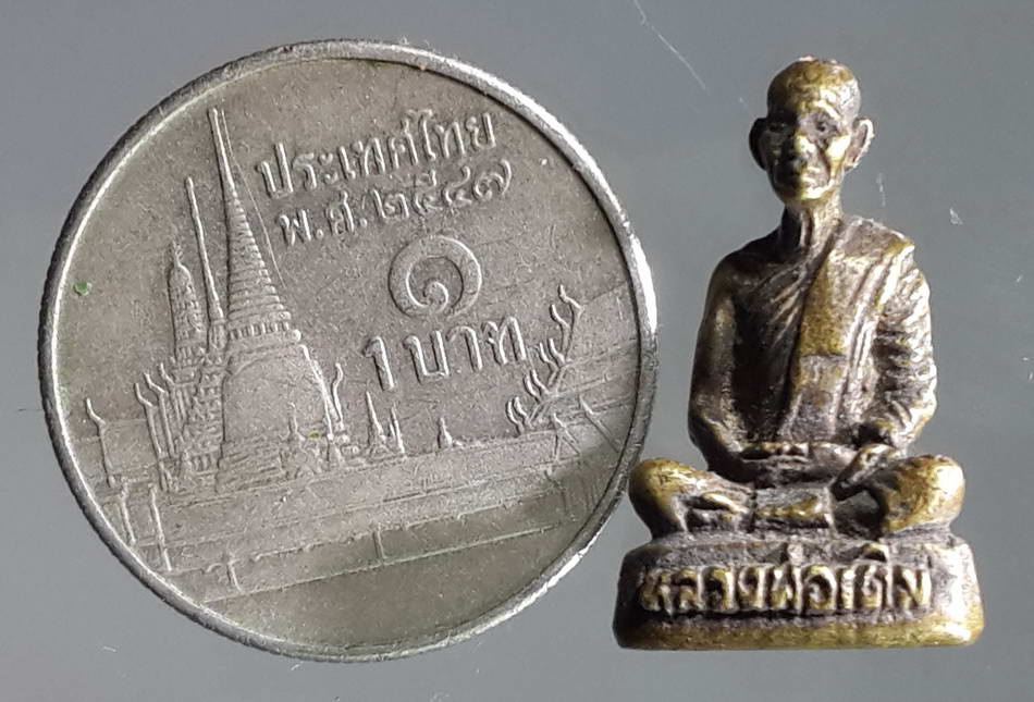 รหัสสินค้า พระกริ่ง พระหล่อ 303 รูปหล่อองค์จ้อย หลวงพ่อเดิม วัดหนองโพ อำเภอตาคลี จังหวัดนครสวรรค์ เนื้อทองสตางค์