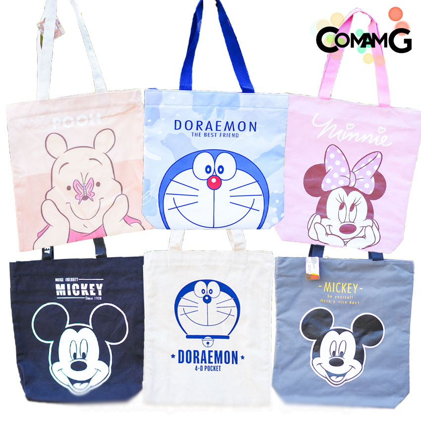 กระเป๋าผ้า ถุงผ้า กระเป๋าผ้าลายการ์ตูนโดเรมอน มินนี่ มิกกี้ หมีพูห์ มีหลายขนาด หลายลาย พร้อมส่ง