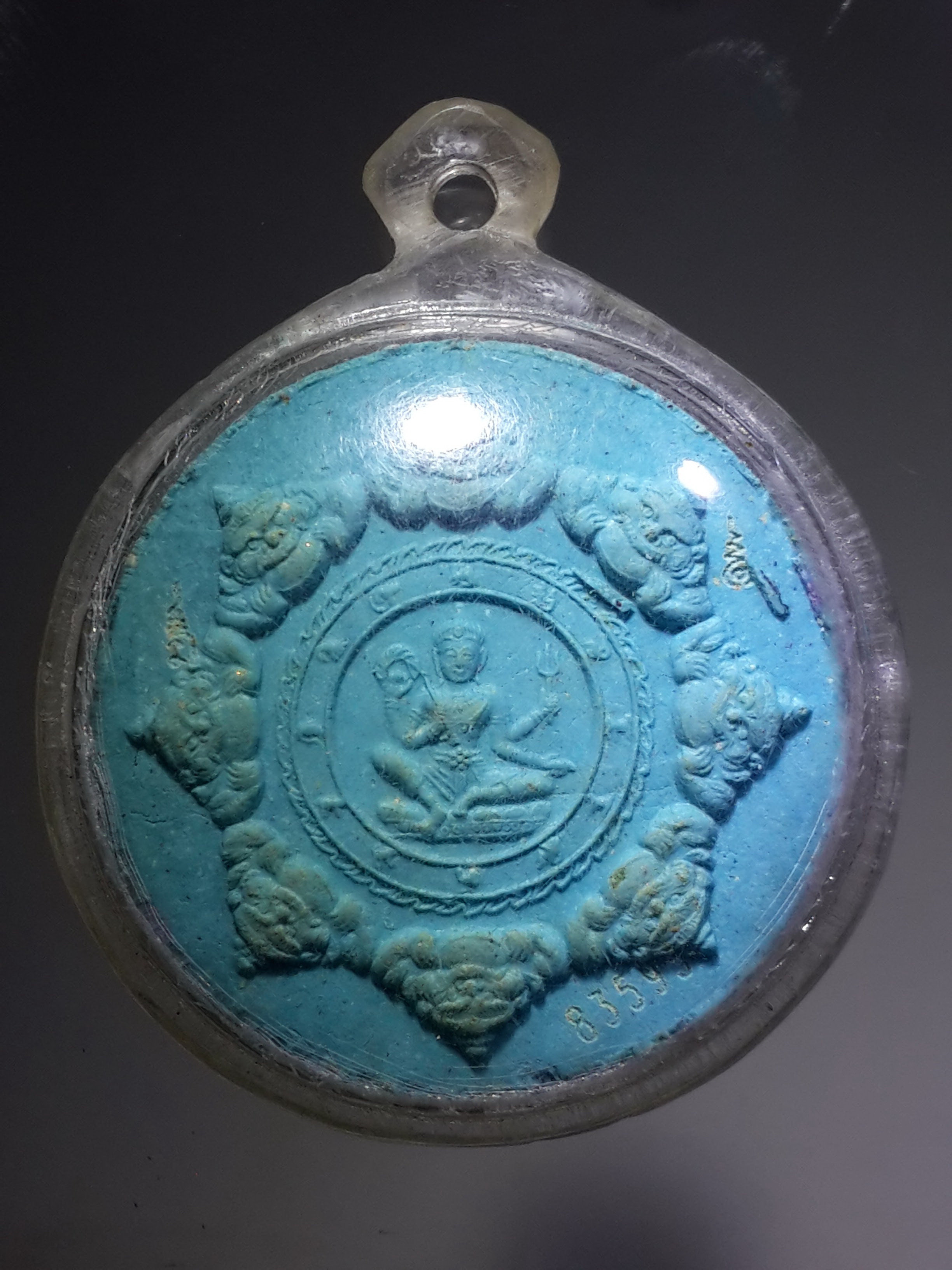 รหัสสินค้า จตุคามรามเทพ 075 จตุคามรามเทพ - หลวงปู่ทวด รุ่นบูรณะหลักเมืองปัตตานี เนื้อสีฟ้า หมายเลข 83593 พระรายการนี้ให้เช่าบูชาแล้ว