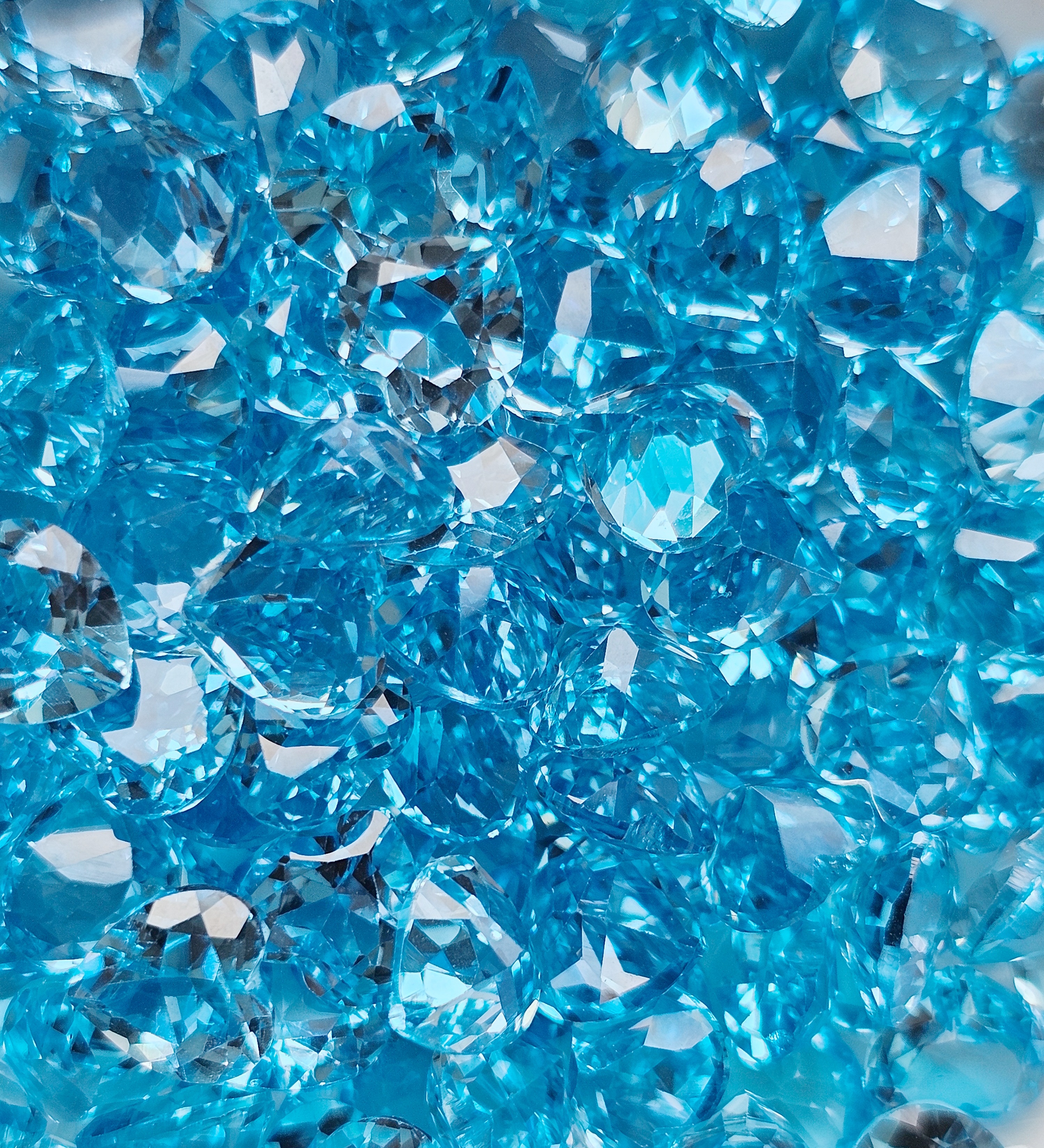 พลอยบลูโทปาสหัวใจ 5.5-5.7มม. 5 กะรัต