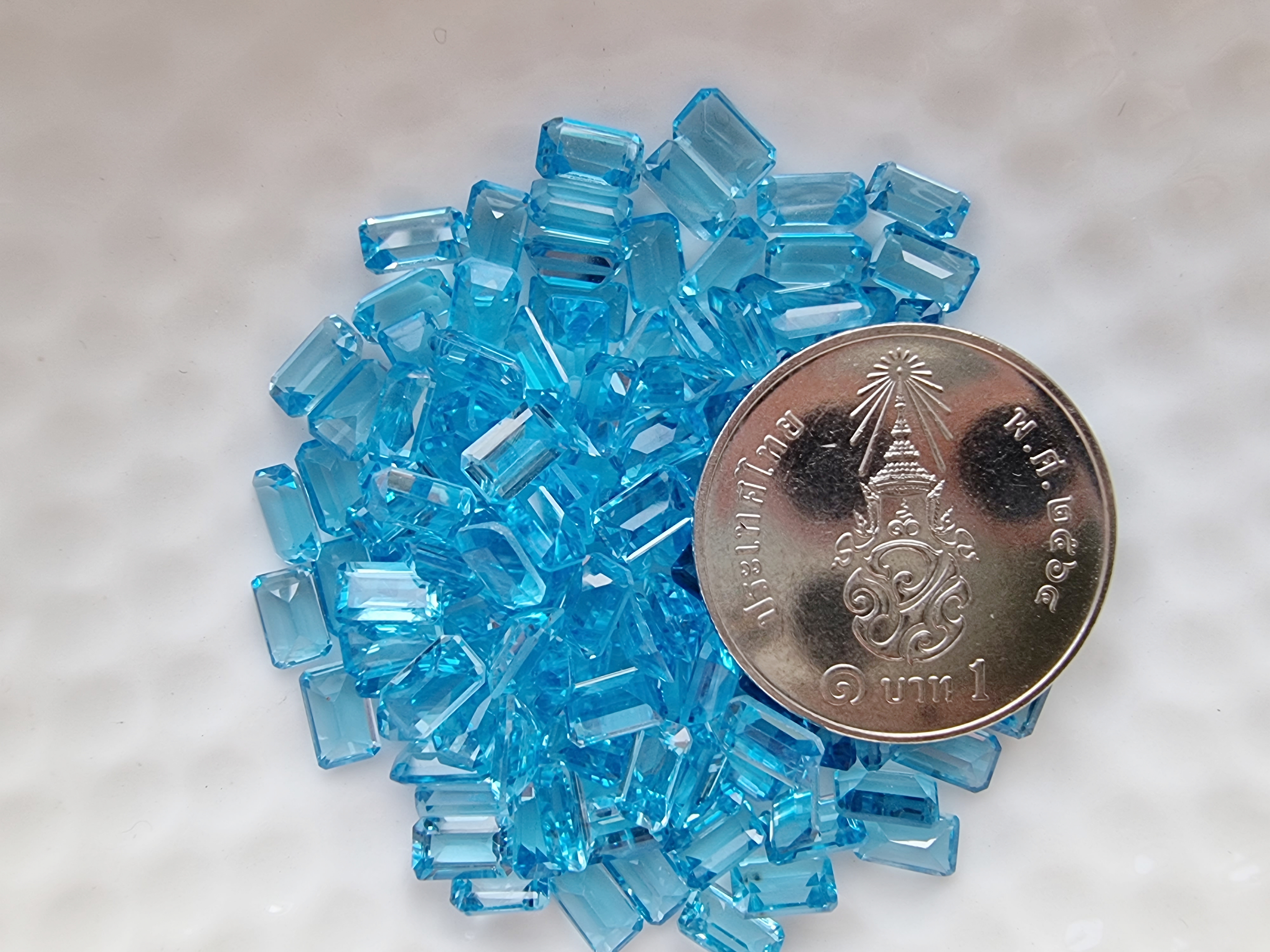 สวิสบลูโทปาสสี่เหลี่ยม 5x3mm. 5 กะรัต