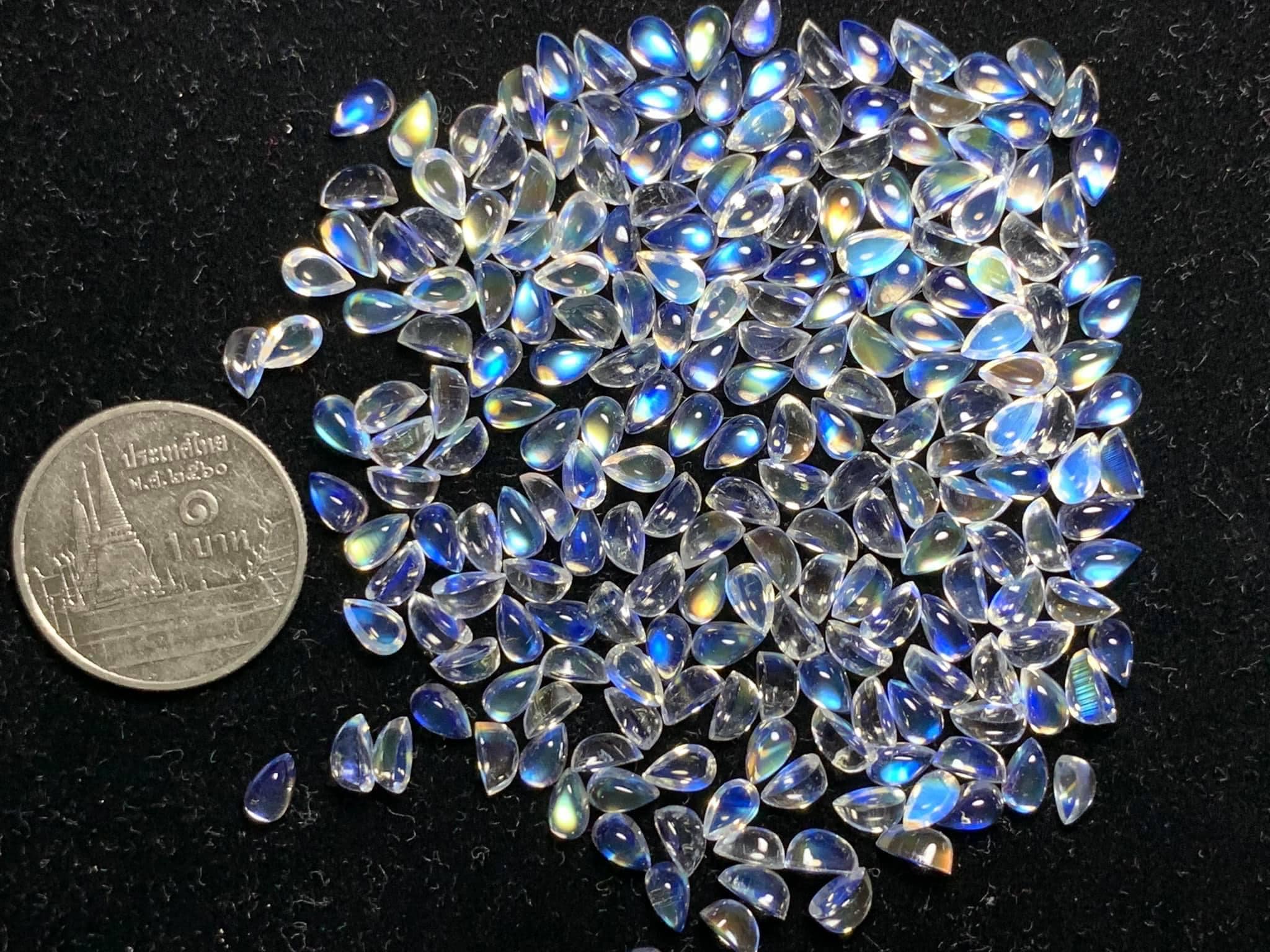 บลูมูนสโตนหยดน้ำหลังเบี้ย 5x3mm. 1 กะรีต