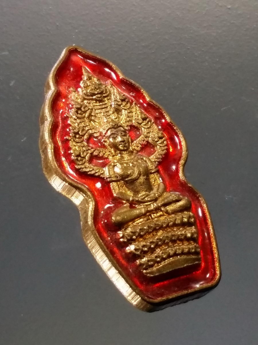 Antig Pim 022 เหรียญทองแดงลงยา พระนาคปรกใบมะขาม หลังเรียบ มีจารอักขระอาคม ไม่ทราบที่