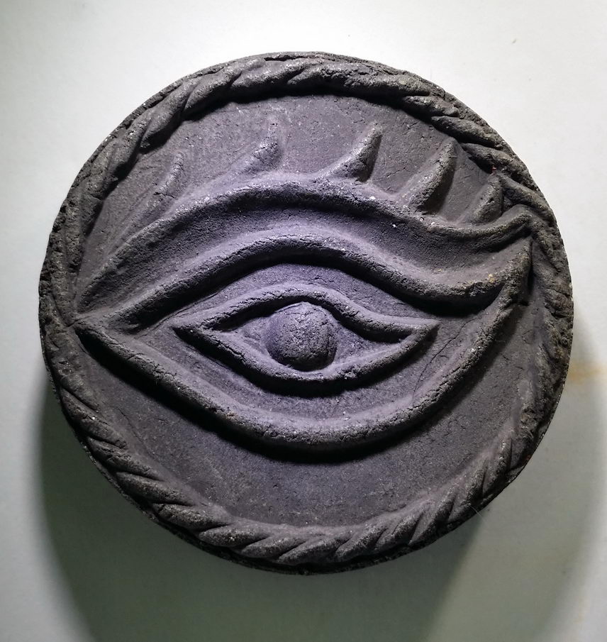 รหัสสินค้า จตุคามรามเทพ 178 ดวงตราพญาราหู หลัง ดวงตา เนื้อผงใบลาน ไม่ทราบวัดที่สร้าง