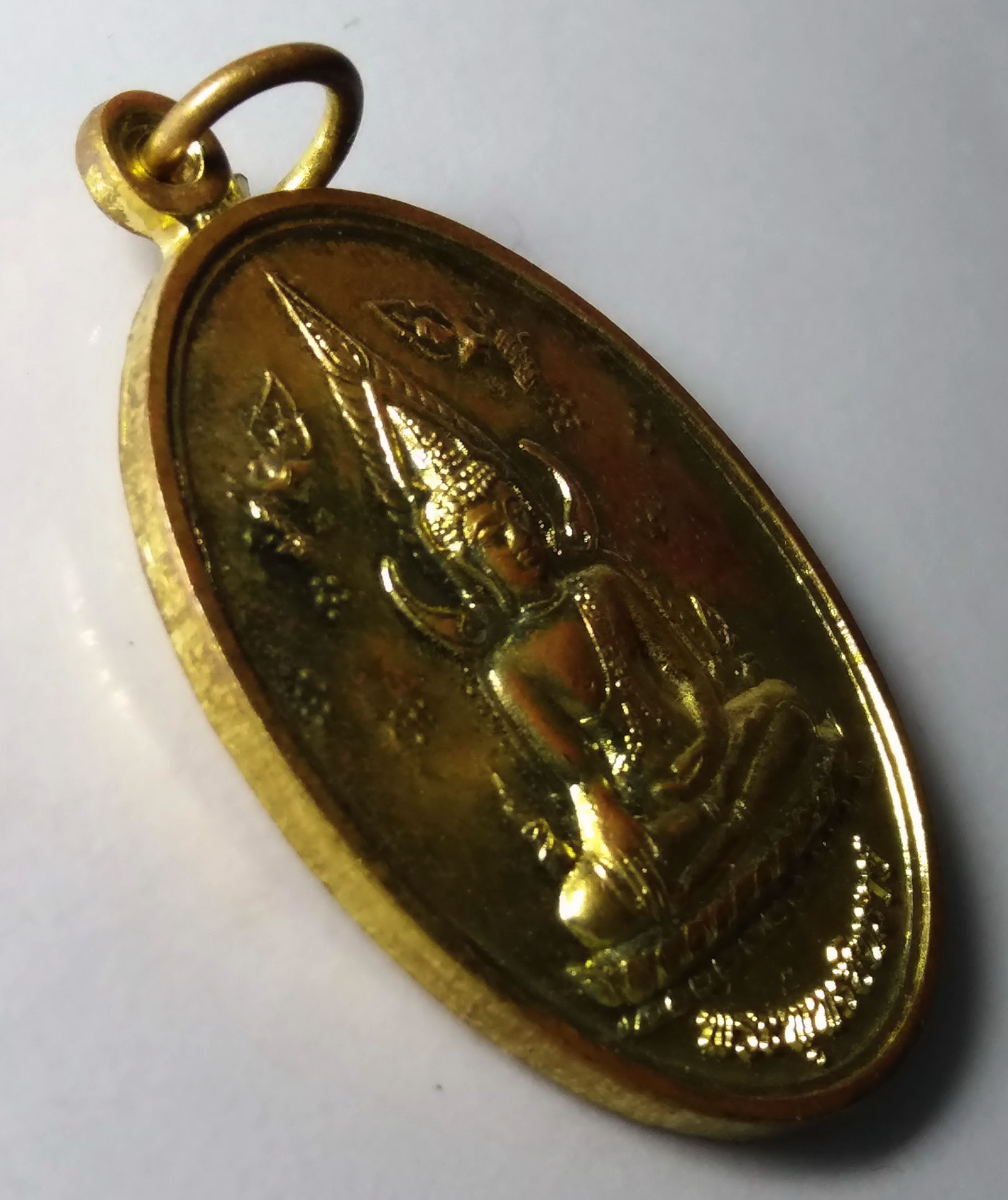 รหัสสินค้า เหรียญพระพุทธ 221 เหรียญพระพุทธชินราช หลังพระธาตุเจดีย์ครูบาแก้ว วัดร่องเสี้ยว ตำบลชัยจุมพล อำเภอลับแล จังหวัดอุตรดิตถ์ สร้างปี 2557 พระรายการนี้ให้เช่าบูชาแล้ว