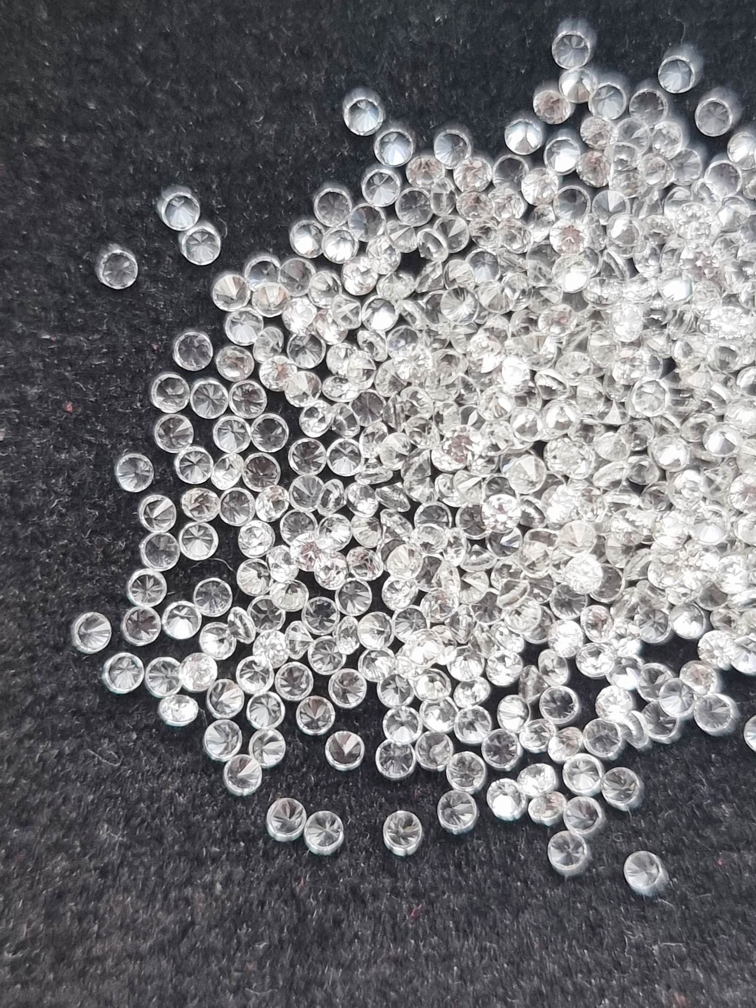 เพทายขาวกลมเจียรเหลี่ยม Size 1.4 มม. 1 กะรัต