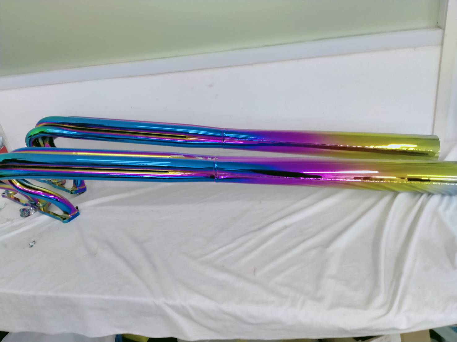 ตัวอย่างท่อเรือซิ่ง ชุบสีไทเทเนียม | PVD Coating