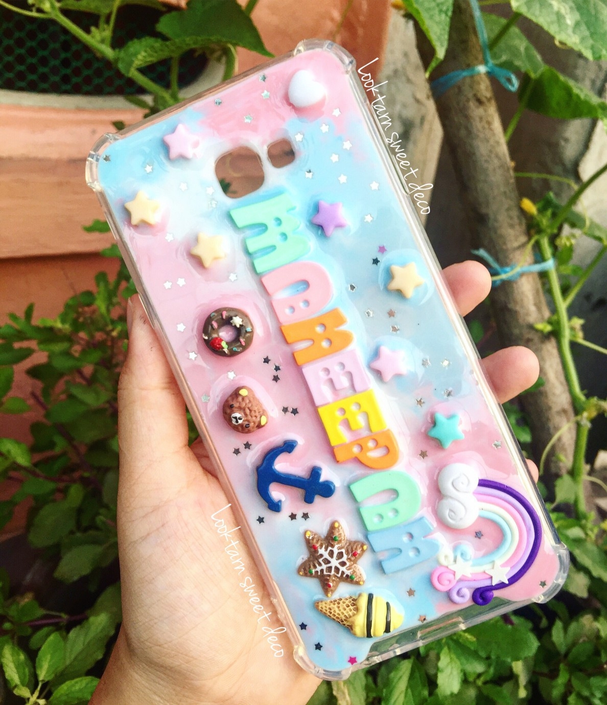เคสสีฟ้า ขาว ชมพู เพิ่มกลิสเตอร์ดาว อักษรคละสี