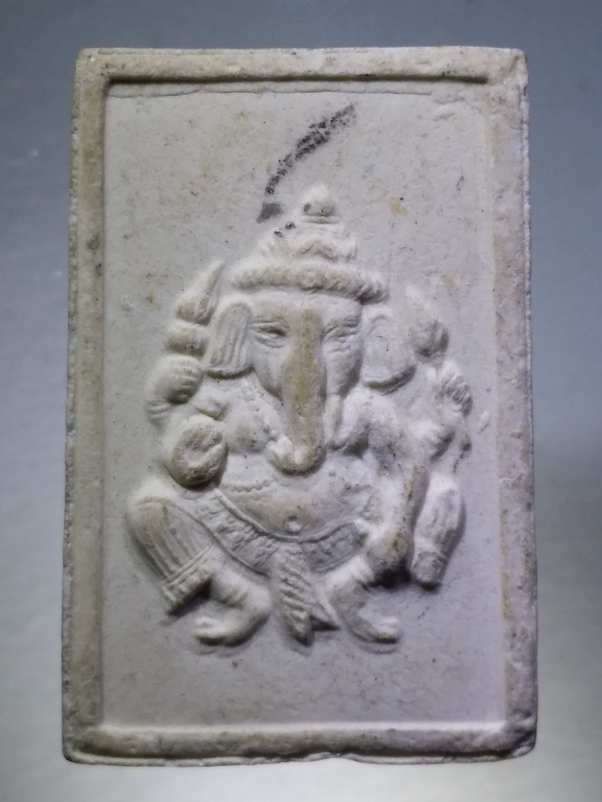 รหัสสินค้า พระไม่ทราบที่ 307 เศียรพ่อแก่ - พระพิฆเณศวร เนื้อผง ไม่ทราบสำนัก