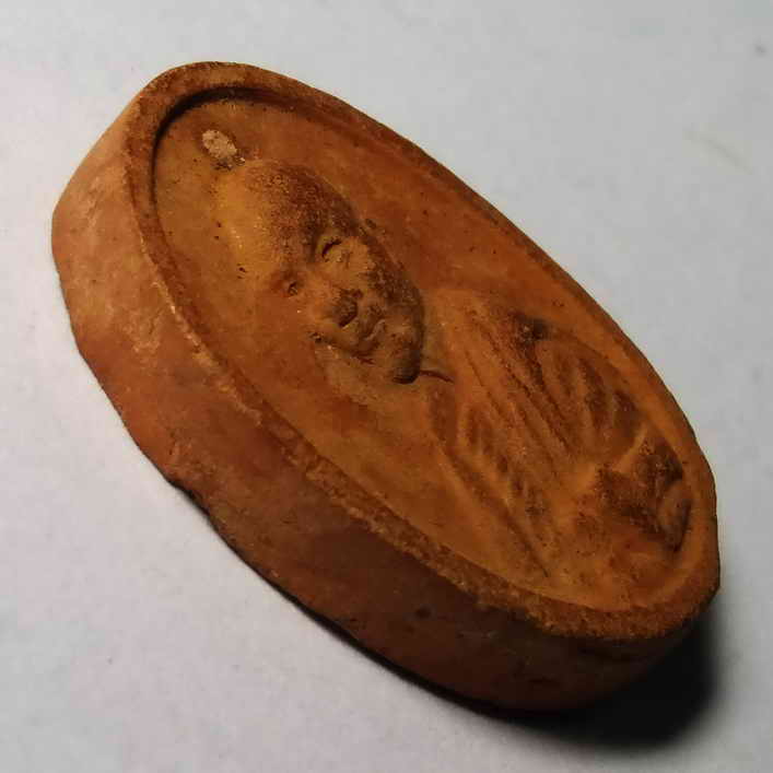 รหัสสินค้า พระเนื้อดิน เนื้อผง เนื้อว่าน 181 พระเนื้อดินเผารูปเหมือน หลวงพ่อแปลก ไม่ทราบที่