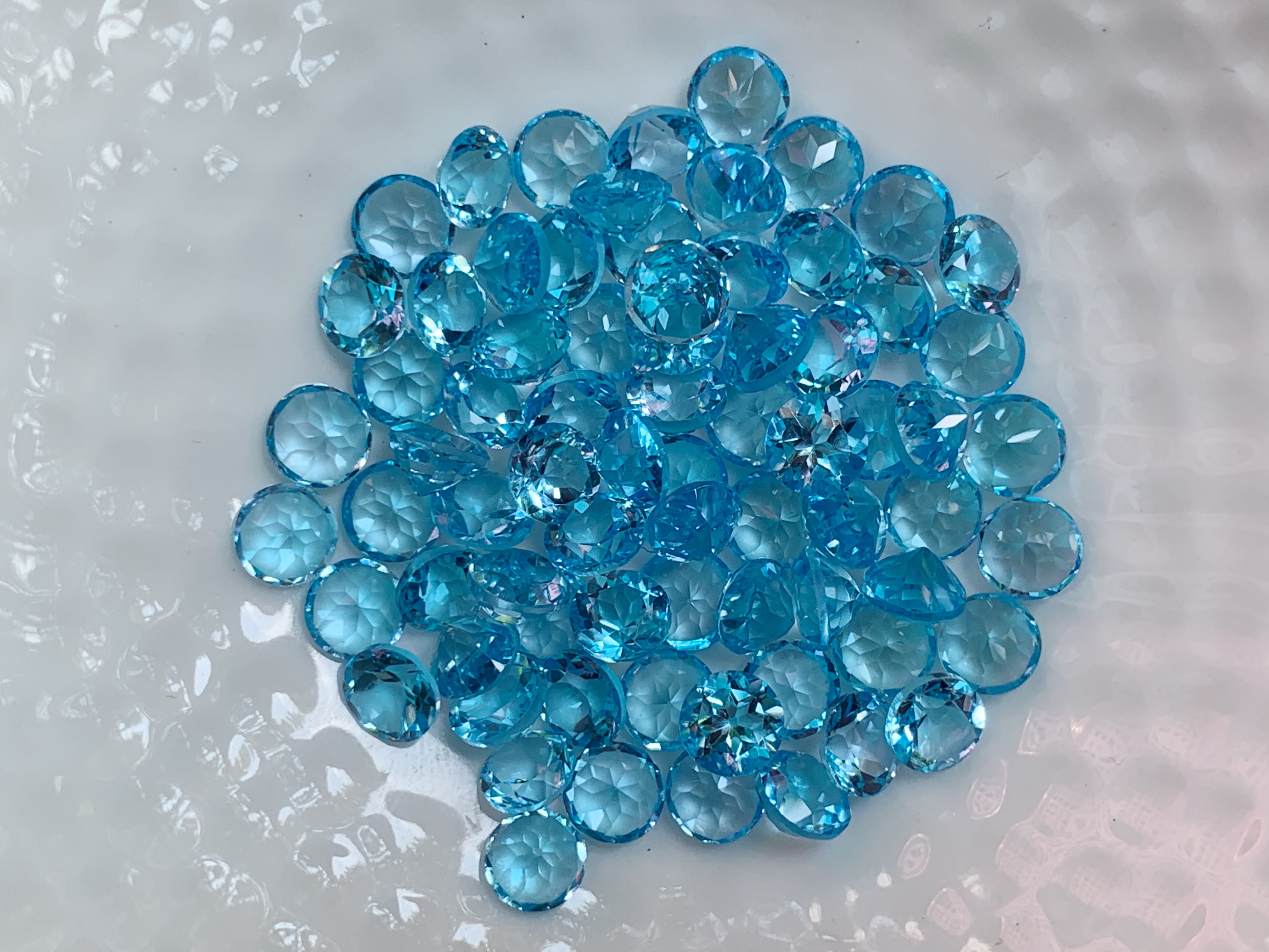 บลูโทปาสกลม 5.0 มม. 5 กะรัต