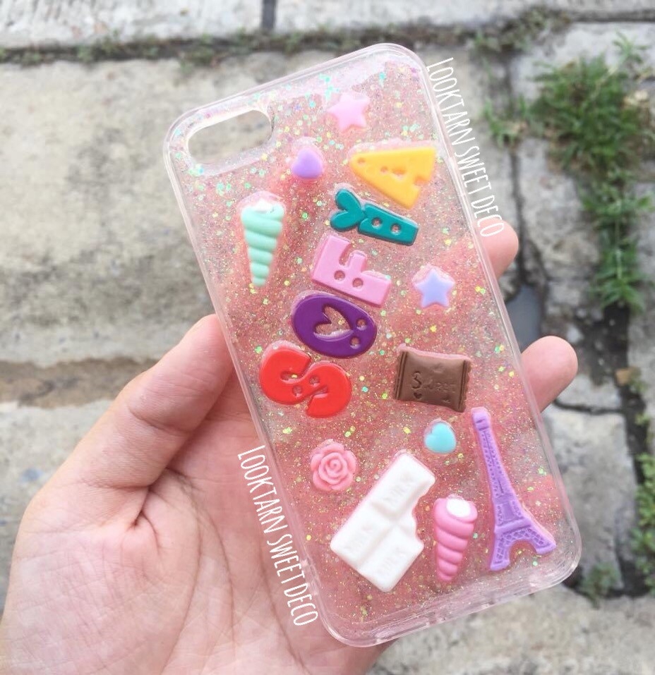 เคสกากเพชรสีชมพูอ่อน อักษรคละสี