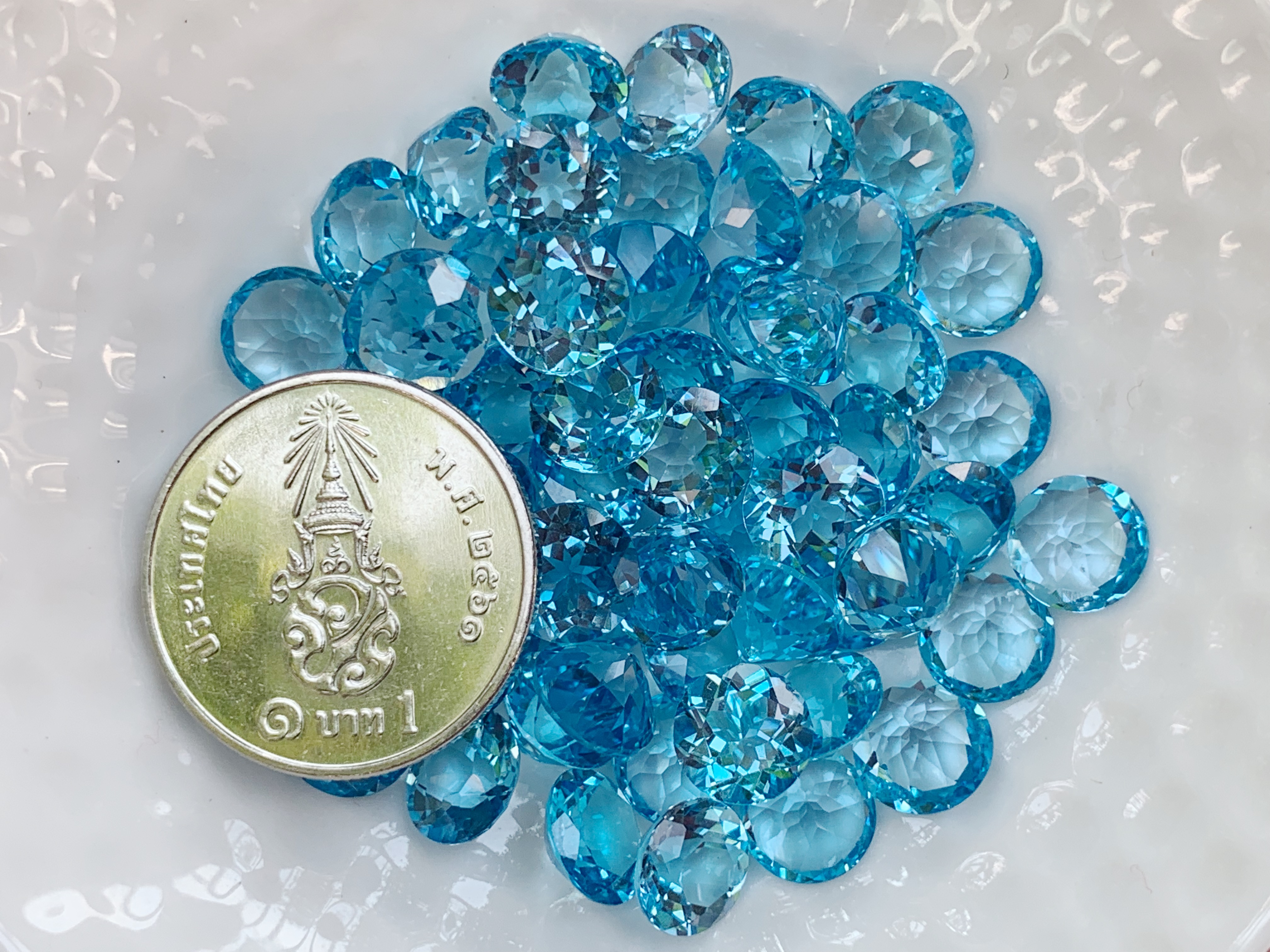 บลูโทปาสกลม 7.0 มม. 5 กะรัต