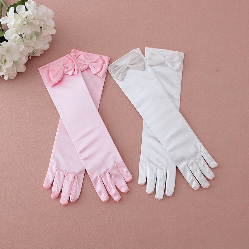 GL10001 ถุงมือเด็กออกงานมีหลายสี เหมาะ3-12ขวบ หรือนิ้วกลาง 2.25-2.75นิ้ว ใช้ในการแสดงหรือออกงาน ยาว12นิ้ว รอบแขนก่อนยืด 6นิ้ว-ยืดถึง9นิ้ว ติดโบว์และมุกน่ารัก