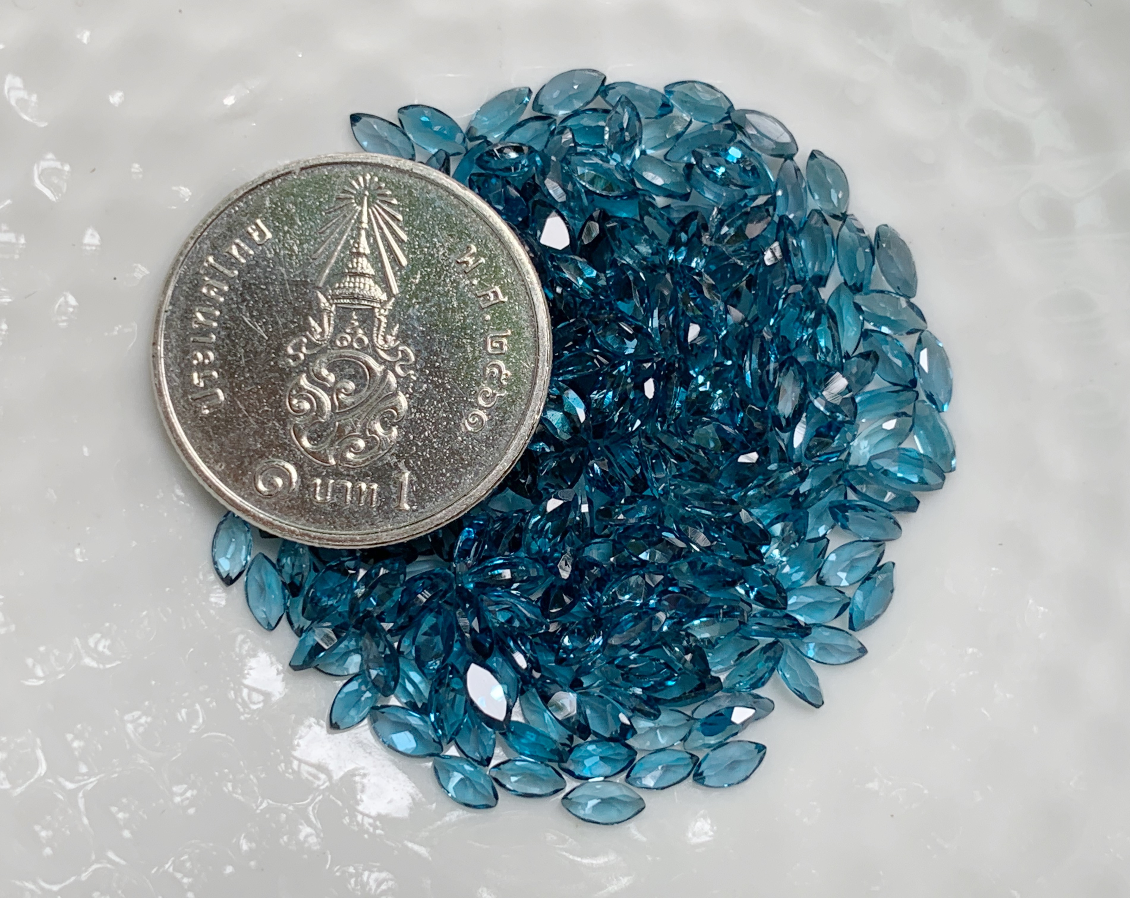 ลอนดอนบลูโทปาสมาคี 4X2 มม. 5 กะรัต