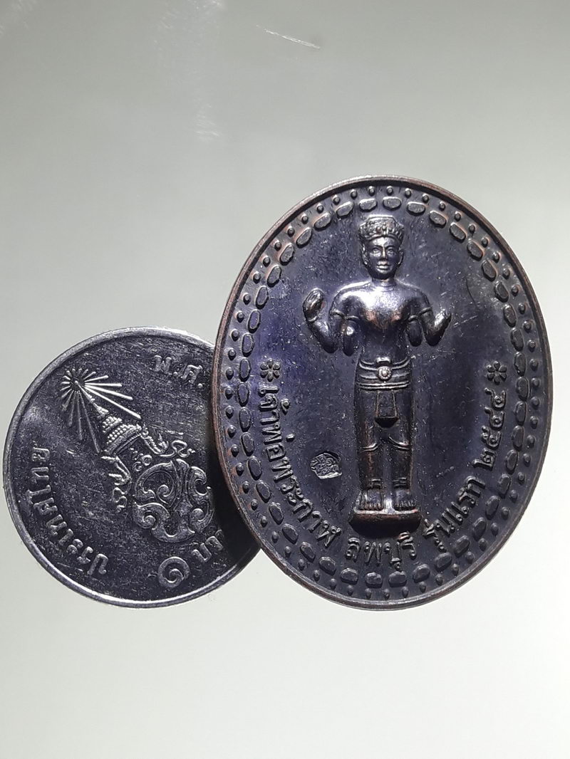รหัสสินค้า เทพจีน - เทพฮินดู 135 เหรียญทองแดงรมดำ เจ้าพ่อพระกาฬ ลพบุรี รุ่นแรกสร้างปี 2544 หลังพระปรางค์สามยอด ตอกโค๊ต ด้านหน้า