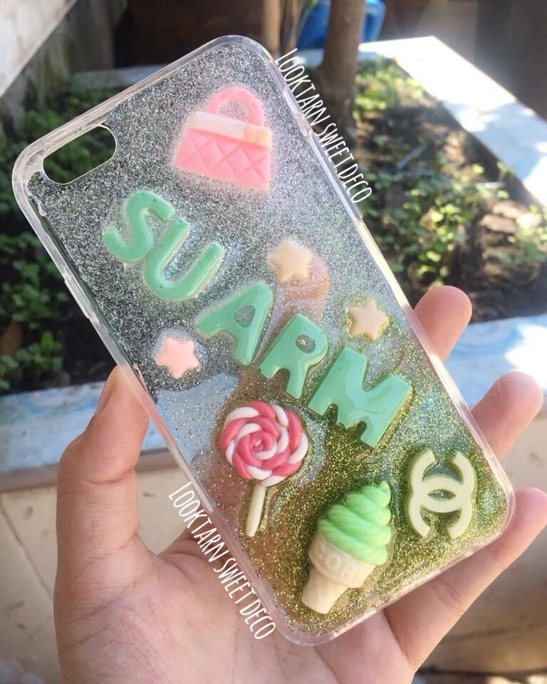 เคสกากเพชรสีขาว เขียว อักษรสีเขียว