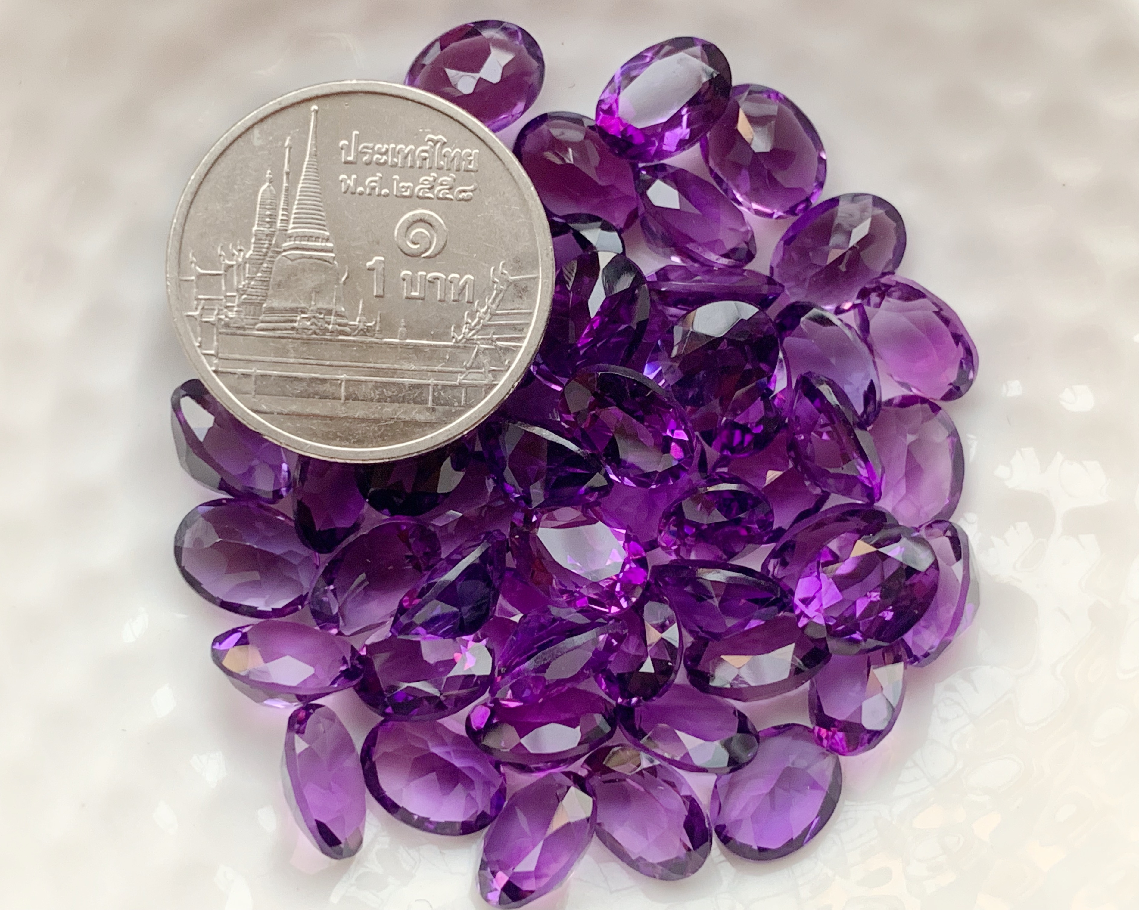 อเมทิสเข้มไข่ 8X6 มม. 5 กะรัต