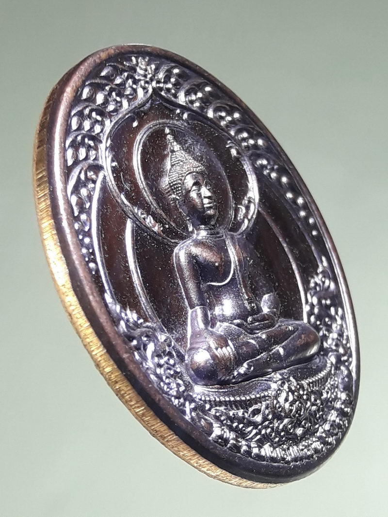 รหัสสินค้า เหรียญพระพุทธ 4339 เหรียญพระองค์แสนศาสดา ที่ระลึกหุ้มทองยอดพระธาตุ จัดสร้างปี 2563 โค้ชเลเซอร์ ด้านหลัง หมายเลข 373