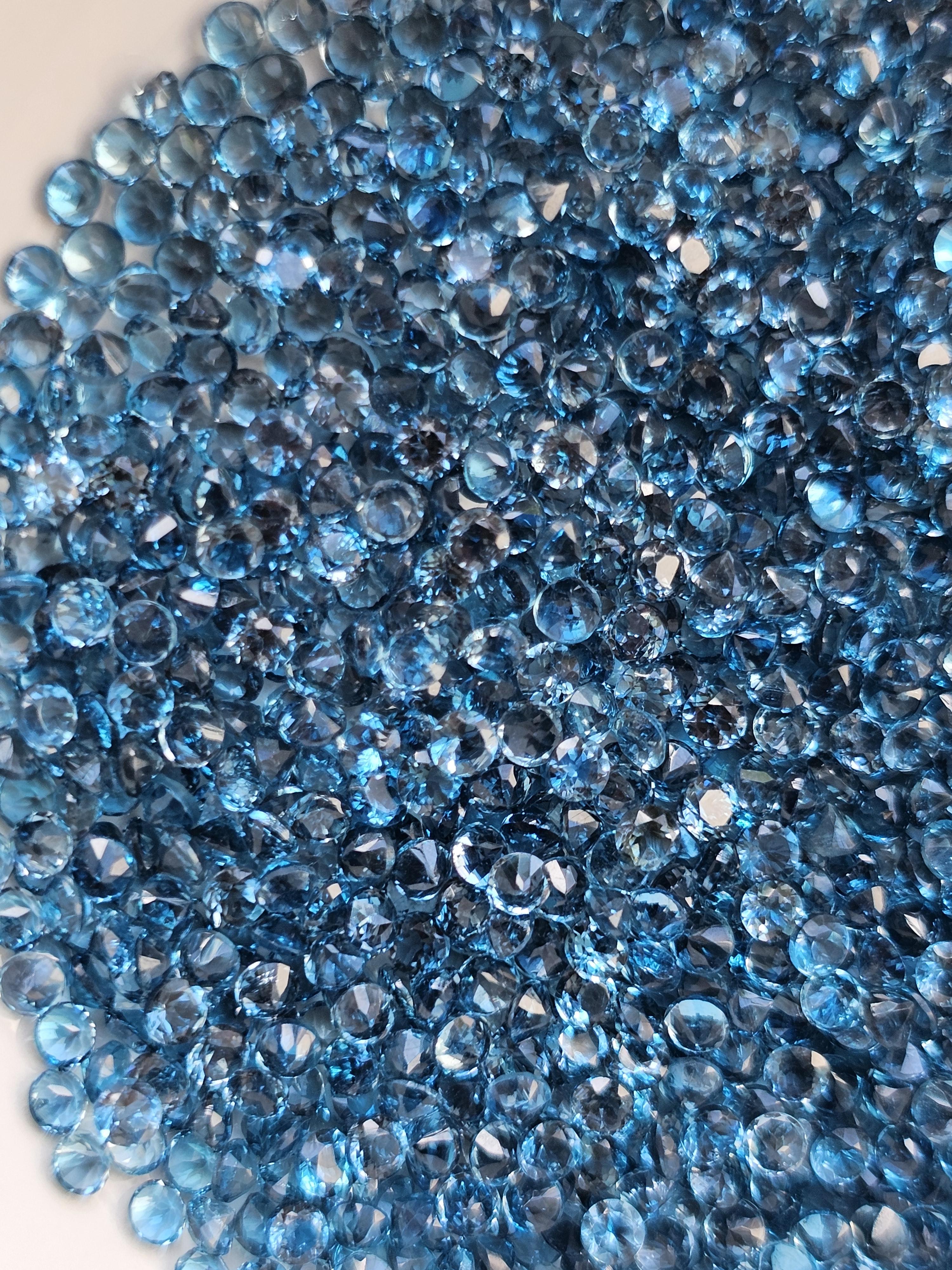 ลอนดอนบลูโทปาสกลมเจียรเหลี่ยม 2.0มม.1 กะรัต