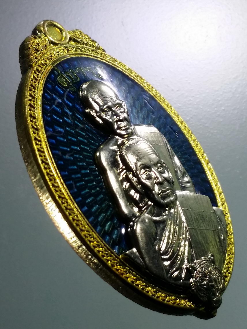 รหัสสินค้า พระมีกล่อง 143 เหรียญทองทิพย์ ลงยา หน้ากากอัลปาก้า หลวงพ่อพัฒน์ วัดห้วยด้วน อำเภอหนองบัว จังหวัดนครสวรรค์ รุ่น คู่บารมี ๒ ตอกโค๊ต หมายเลข ๓๑