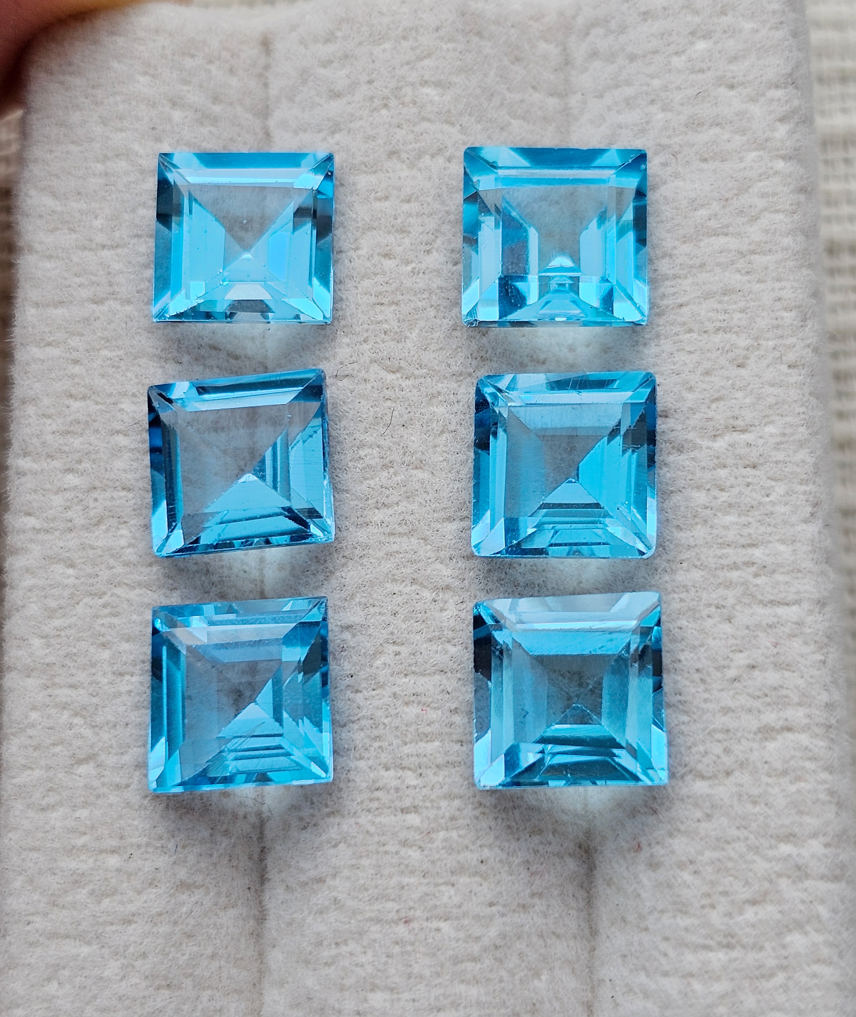 พลอยบลูโทปาสสี่เหลี่ยม 7x7 mm. 1 เม็ด