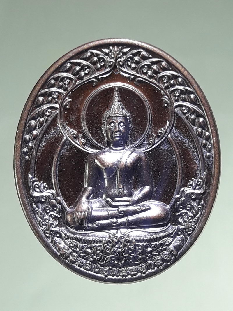 รหัสสินค้า เหรียญพระพุทธ 4339 เหรียญพระองค์แสนศาสดา ที่ระลึกหุ้มทองยอดพระธาตุ จัดสร้างปี 2563 โค้ชเลเซอร์ ด้านหลัง หมายเลข 373