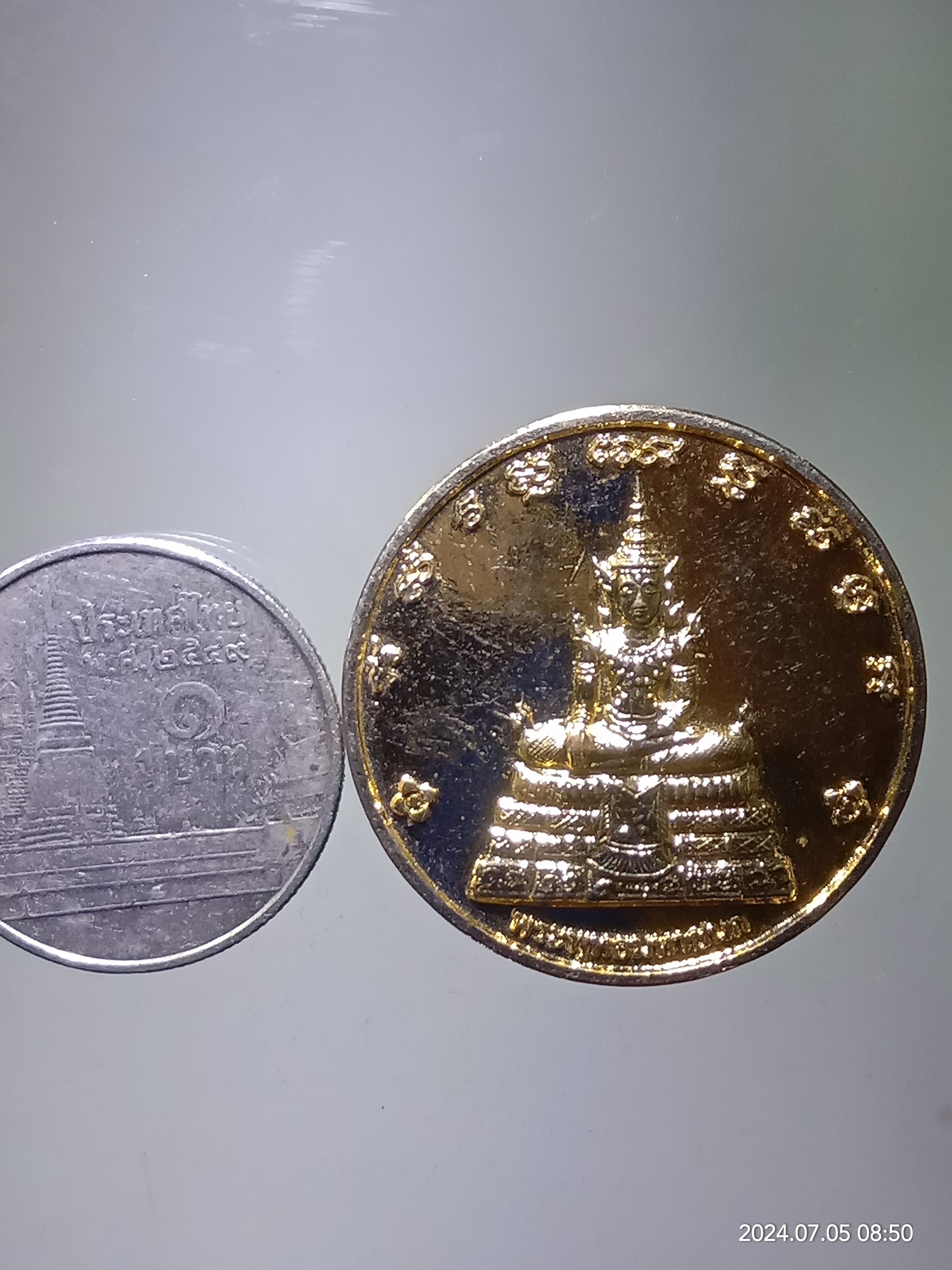 รหัสสินค้า เหรียญพระพุทธ 146 เหรียญกลมกะไหล่ทอง พระพุทธมหาชนก วัดปทุมคงคา กรุงเทพมหานคร สร้างปี 2548