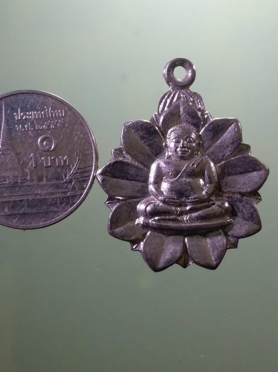 รหัสสินค้า เหรียญพระพุทธ 4117 เหรียญพระสังกัจจายน์ ด้านหลังเขียนว่า ทองพูน ไม่ทราบที่ ขนาดเมื่อเทียบกับเหรียญบาท ศิลปะสวยมากๆครับ