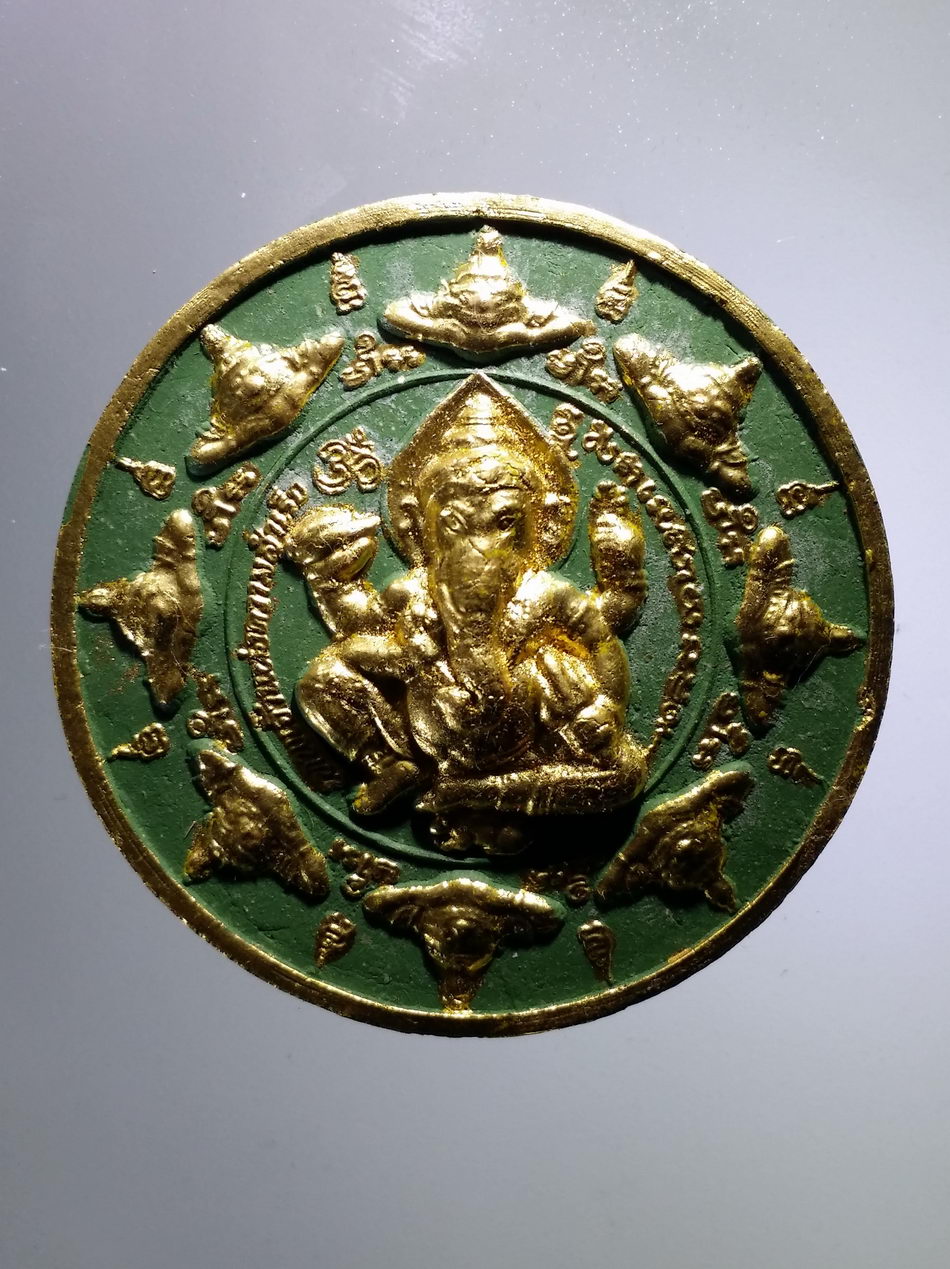 รหัสสินค้า จตุคามรามเทพ 466 หลวงพ่อโต - พระพิฆเนศ รุ่น โตสัมฤทธิ์ผล วัดพนัญเชิงวรวิหาร จังหวัดพระนครศรีอยุธยา เนื้อว่านเขียวปัดทอง กดพิมพ์นำฤกษ์ 26 พฤษภาคม พุทธาภิเษก 4 สิงหาคม ปี 2550 ปลุกเสกพิธี จตุคามรามเทพ