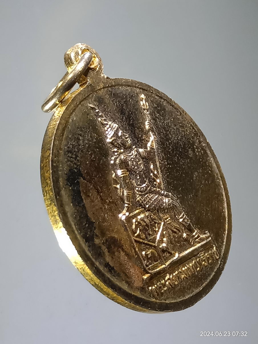 รหัสสินค้า เหรียญพระพุทธ 008 เหรียญกะไหล่ทอง พระแก้วมรกต หลังพระสยามเทวาธิราช ไม่ทราบวัดที่สร้าง