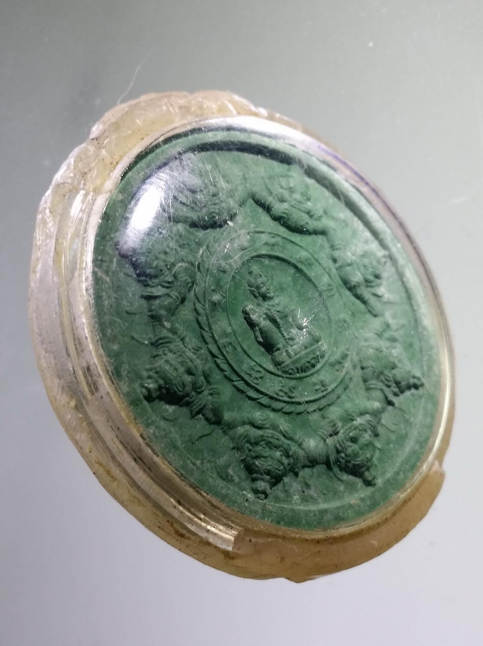 รหัสสินค้า จตุคามรามเทพ 926 พระเทวราชโพธิสัตว์จตุคามราม เทพเนื้อว่านเขียว หลังดวงตราสุริยันและจันทรา ไม่ทราบรุ่น