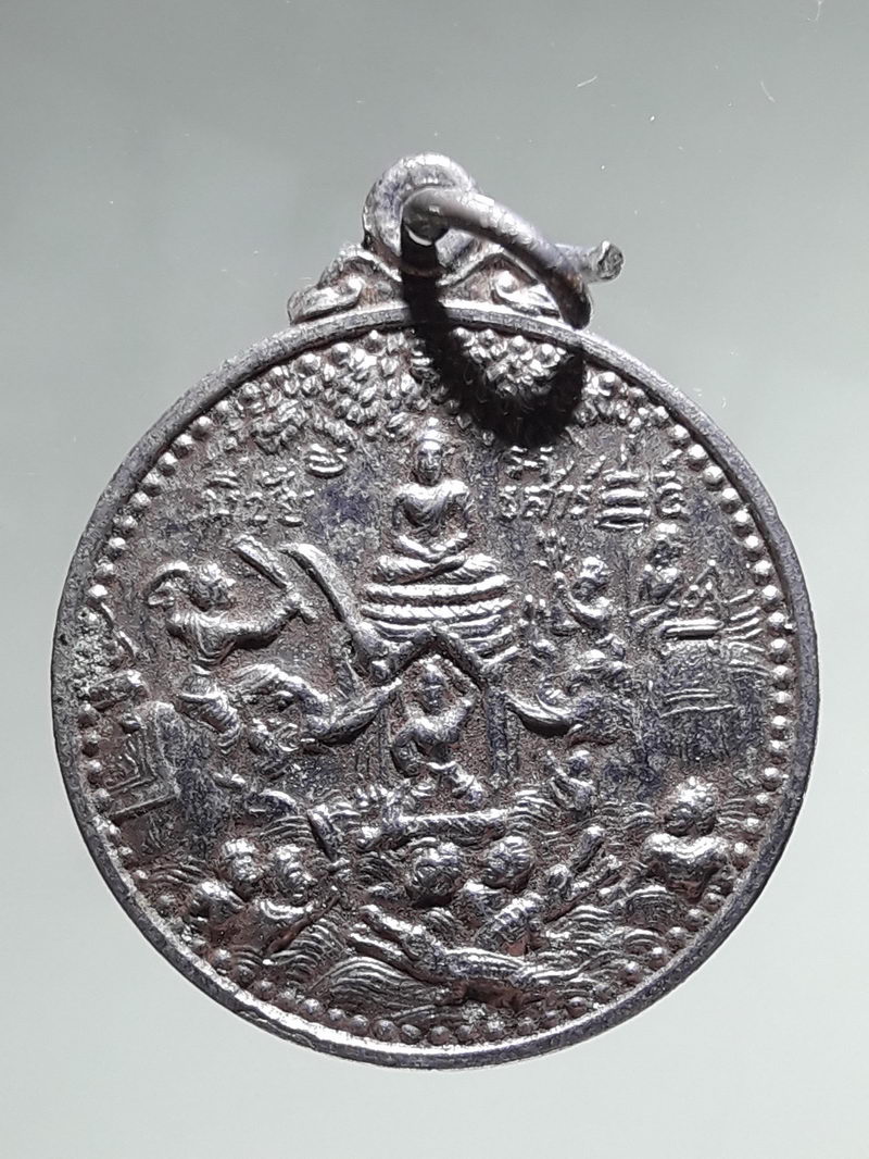 รหัสสินค้า เหรียญพระพุทธ 4323 เหรียญกลมกะไหล่นิกเกิล พระพุทธเจ้าผจญพญามาร ที่ระลึกในการสร้างพระอุโบสถ วัดศรีโสภณ อำเภอวังทอง จังหวัดพิษณุโลก สร้างปี 2523 หลังสมเด็จพระนเรศวรประกาศอิสรภาพ