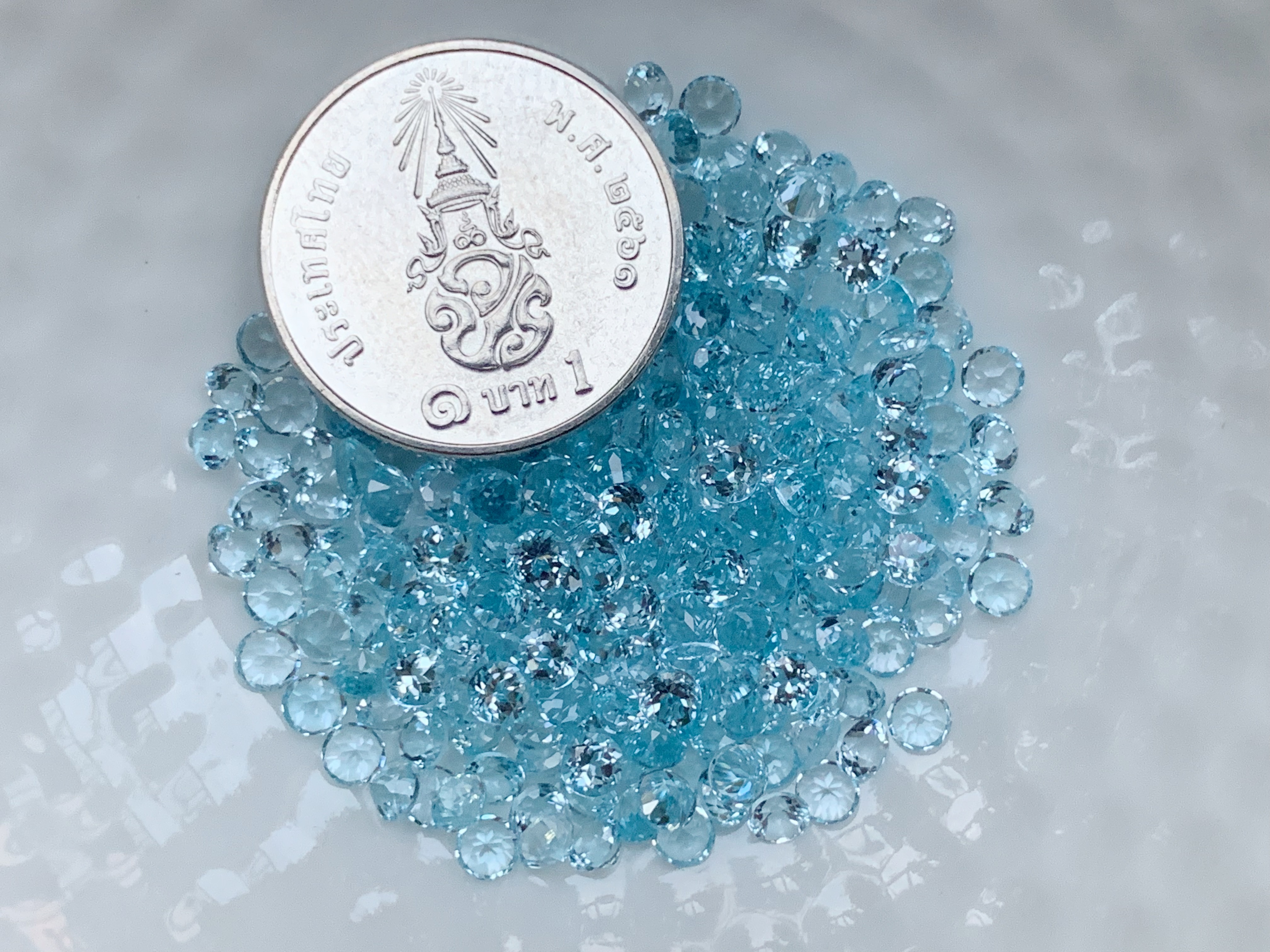 บลูโทปาสกลม 3.0 มม. 5 กะรัต