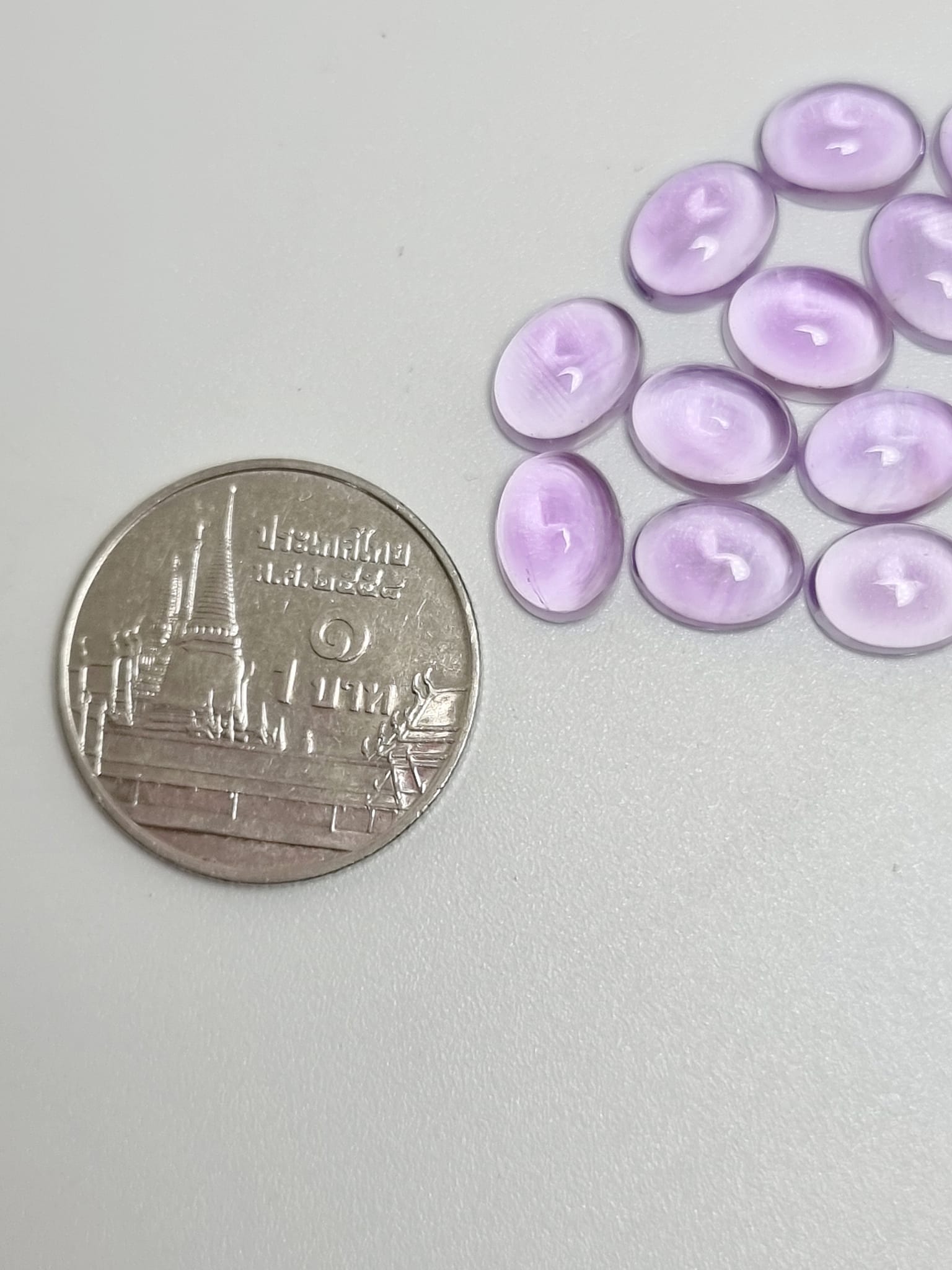 พลอยอเมทิสไข่่หลังเบี้ย 8x6 mm. 20 กะรัต