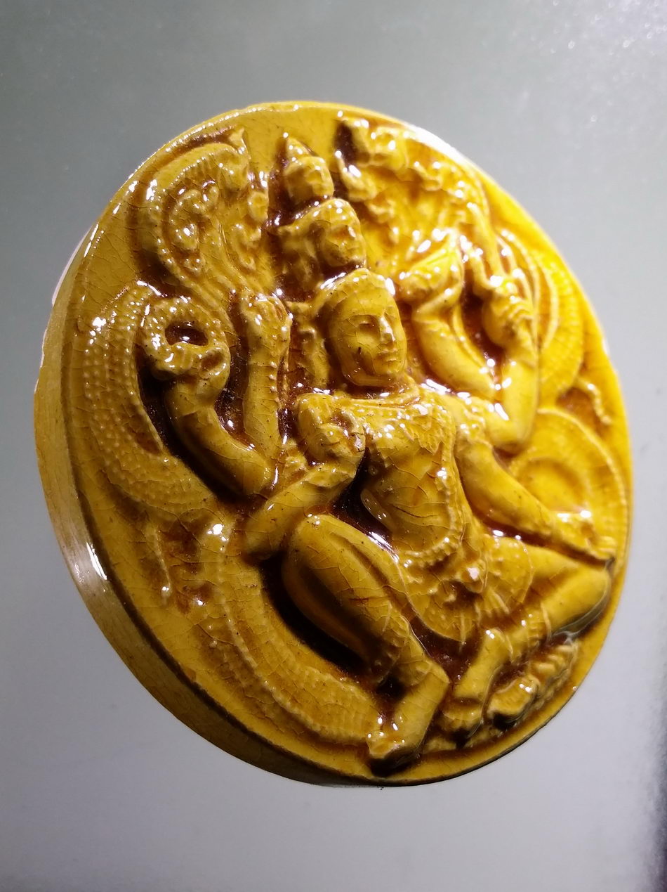 รหัสสินค้า จตุคามรามเทพ 980 จตุคามรามเทพ รุ่น เก้าหน้ามหาโชคมหาเศรษฐี วัดอ้ายเขียว เนื้อกระเบื้องเคลือบเหลือง