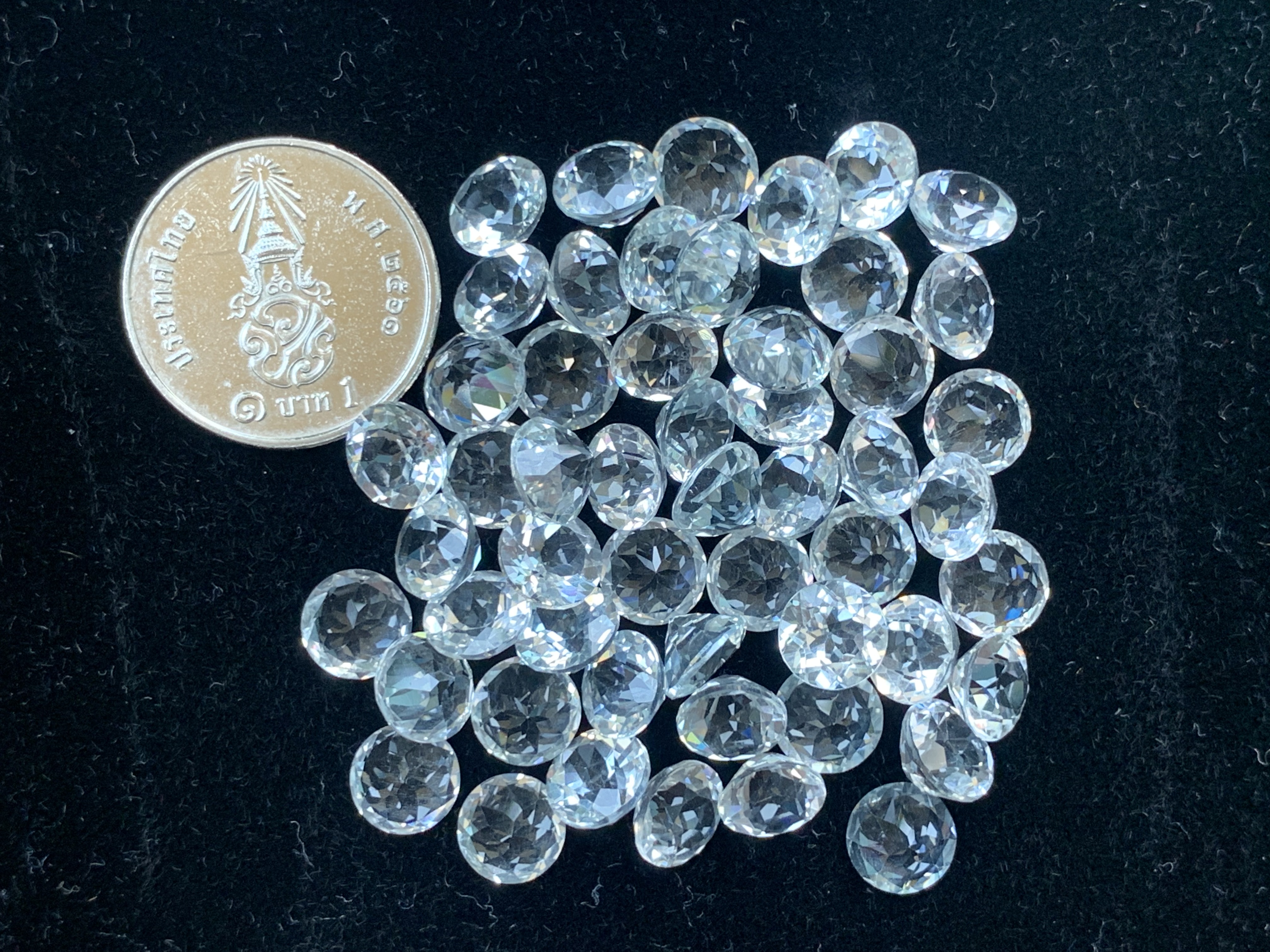 ไวท์โทปาสกลม 6 มม. 5 กะรัต