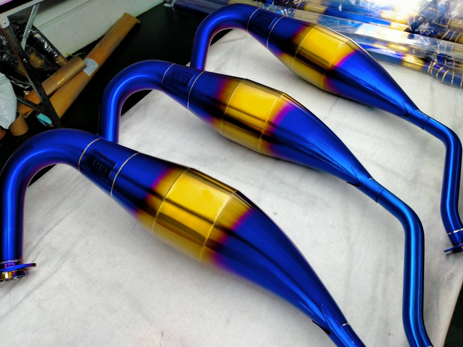 ตัวอย่างงานทำสีไทเทเนียม ท่อมอเตอร์ไซค์ | PVD Coating