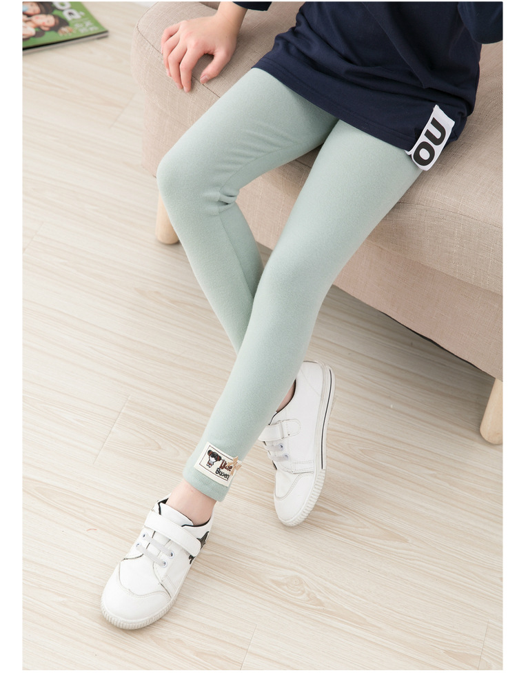 P30983พร้อมส่ง เลกกิ้งเด็กสีเขียวติดอาร์มตุ๊กตาน้อย+ติดโบว์สีทอง