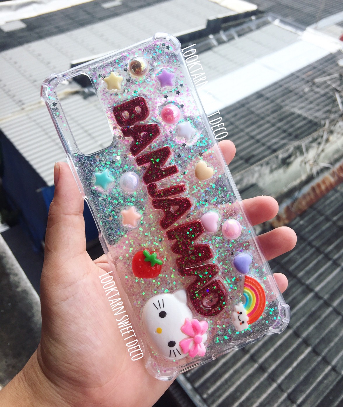 เคสกากเพชรขาวใสอักษรกากเพชรม่วงบานเย็น