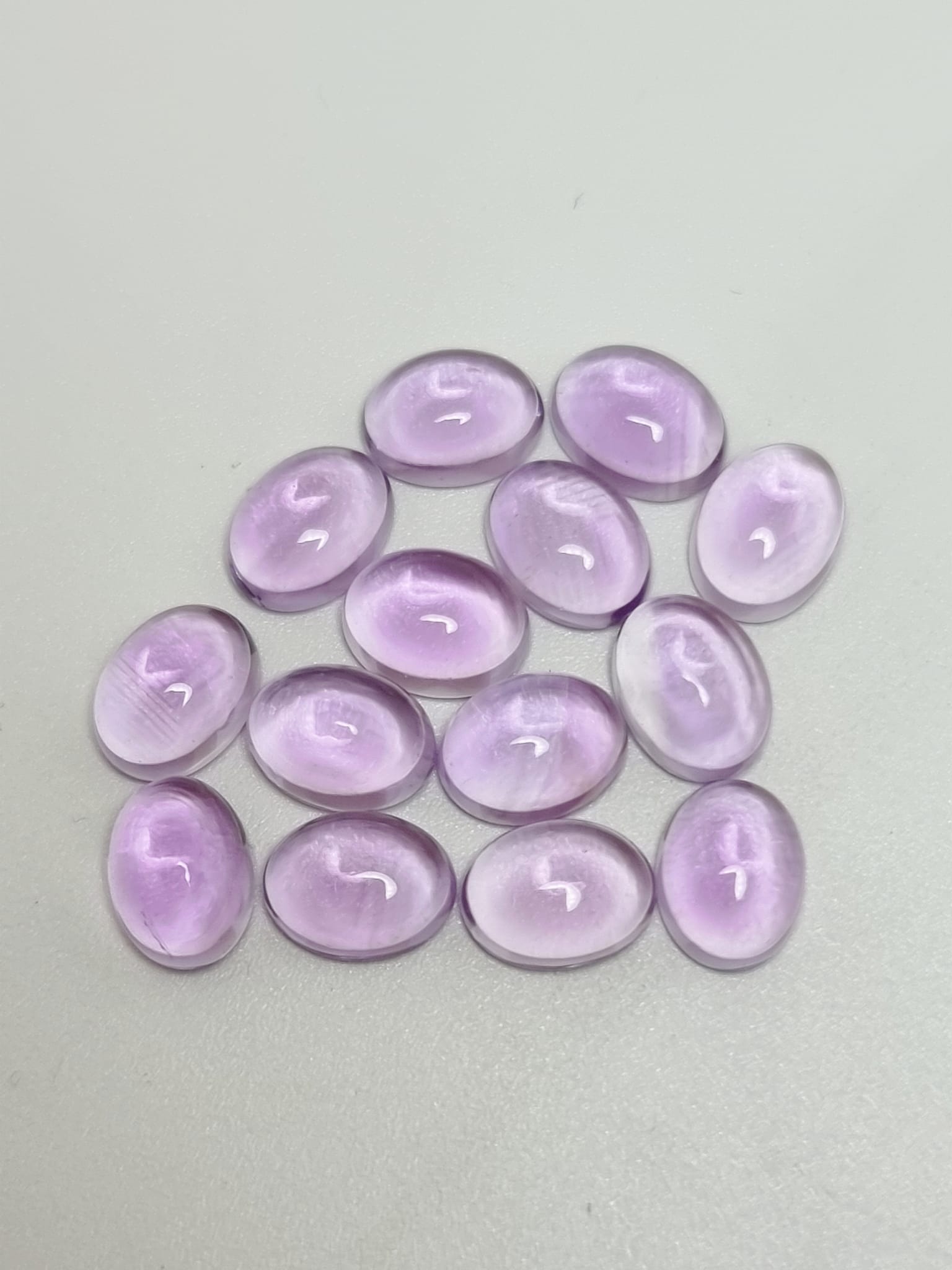 พลอยอเมทิสไข่่หลังเบี้ย 8x6 mm. 20 กะรัต