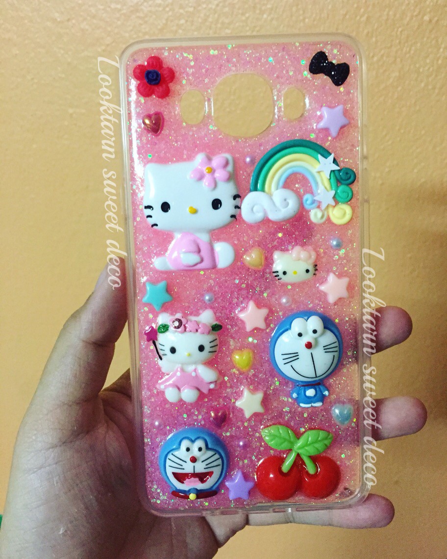 เคสกากเพชรชมพู ตกแต่งโดเรม่อน คิตตี้