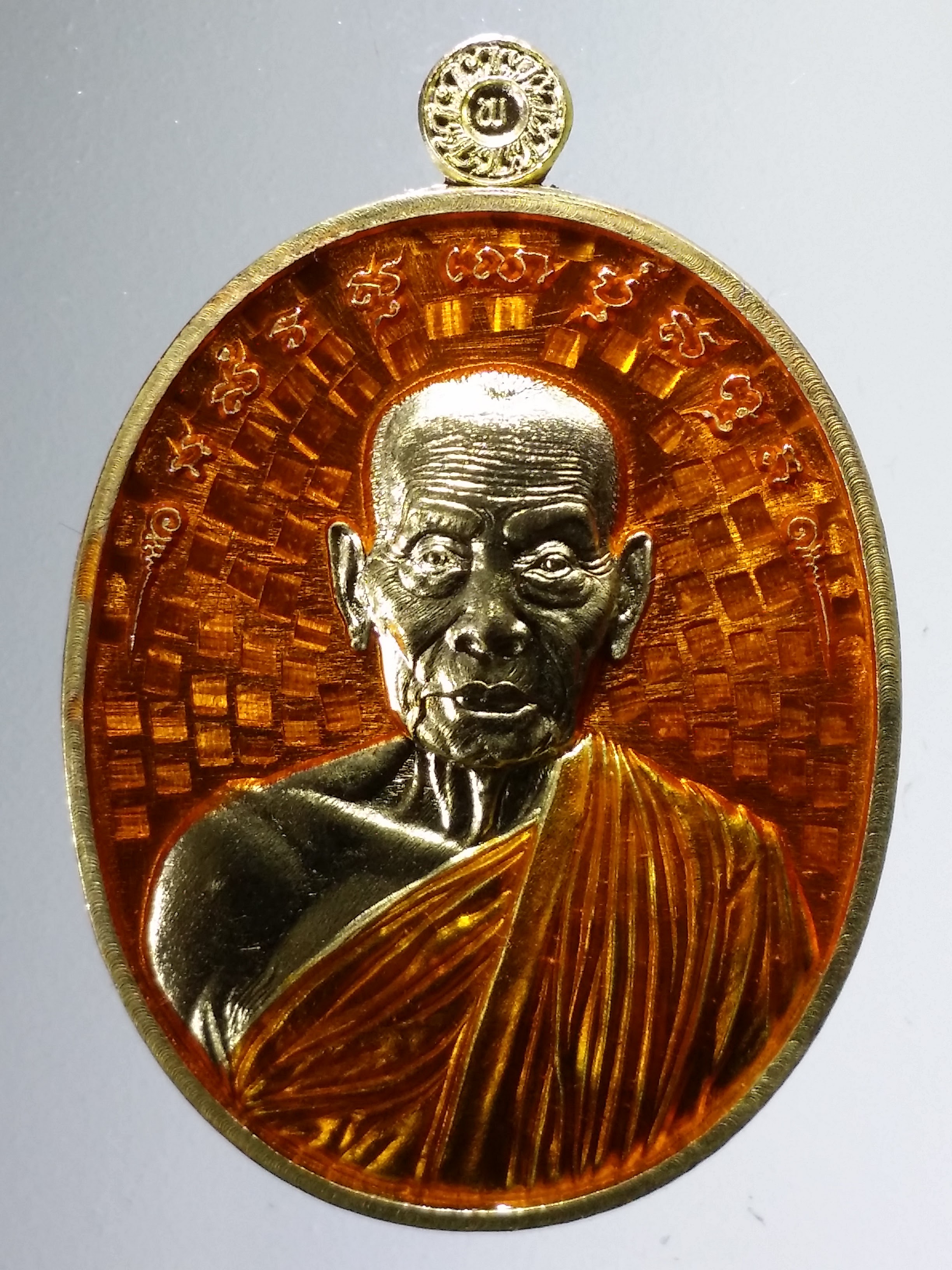 รหัสสินค้า พระมีกล่อง 1568 ชนะมาร ปี 64 หลวงพ่อพัฒน์ วัดห้วยด้วน เนื้อทองทิพย์ ลงยาจีวร พื้นสีส้ม ตอกโค๊ต ล. หมายเลข ๕๕๘